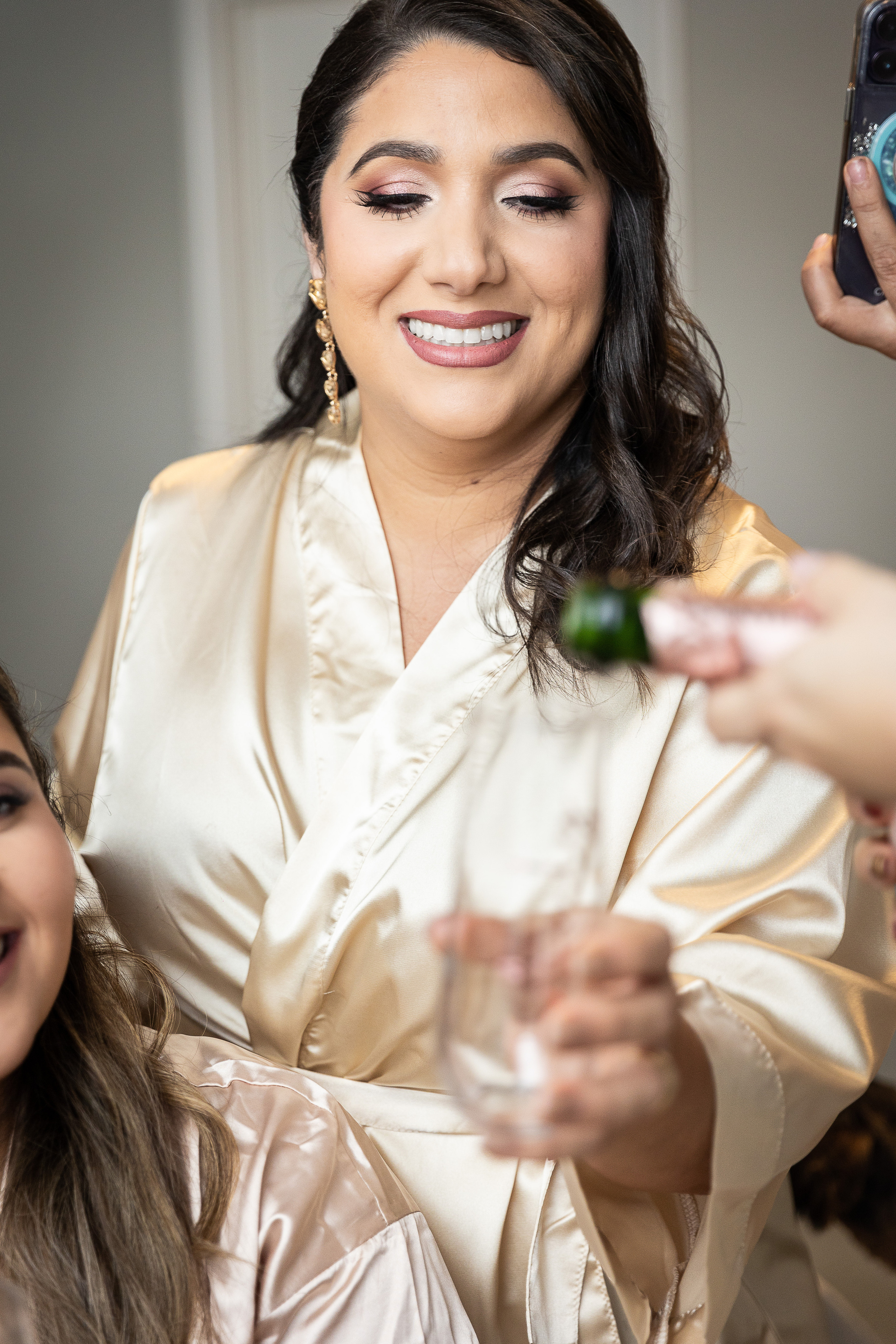 Bridesmaids and champagne bride morning