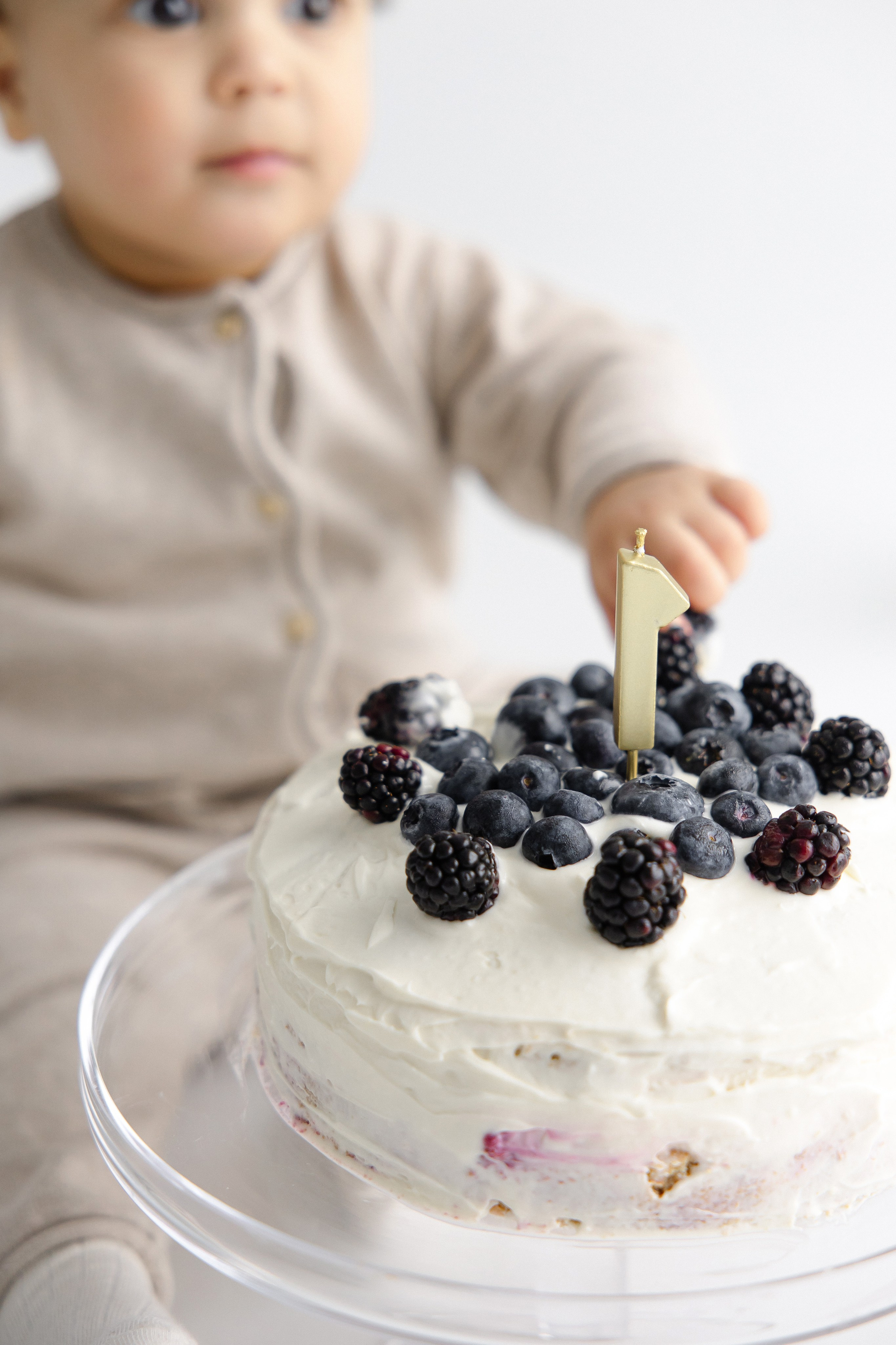 Cute baby enjoying a cake smash session