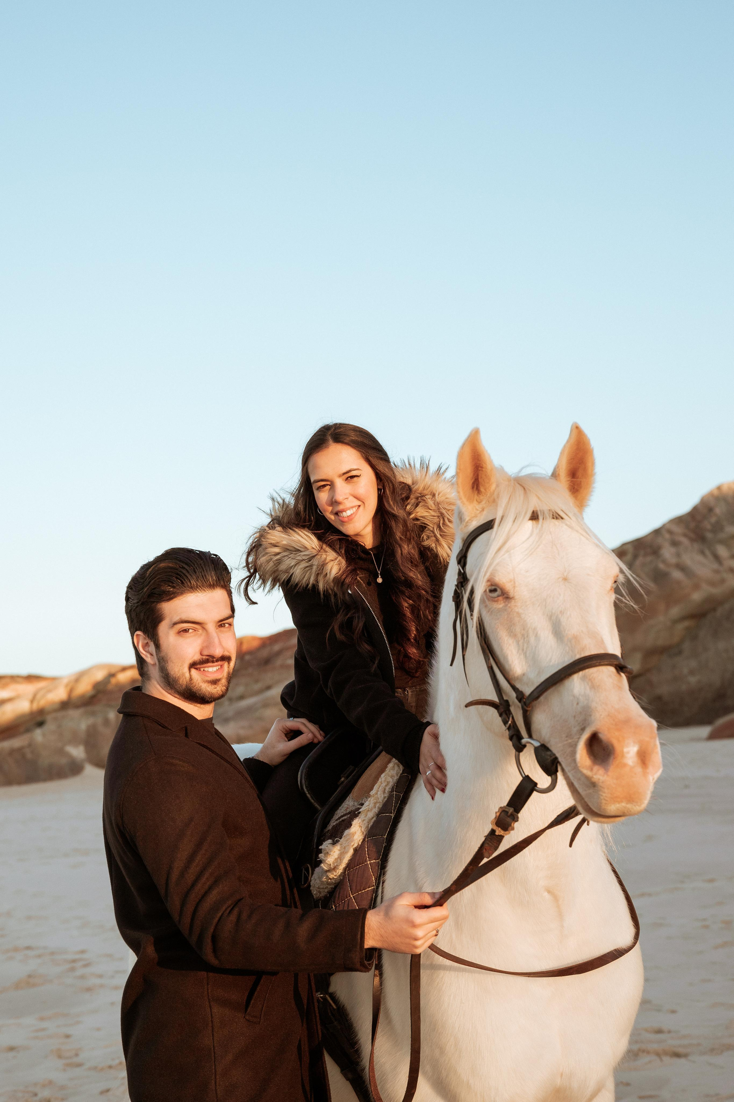 Photo session on horseback at Praia da Almagreira. Luxury Wedding Photography & Cinematic Films | Portugal & Destination Weddings | Ricardo & Mary Pictures