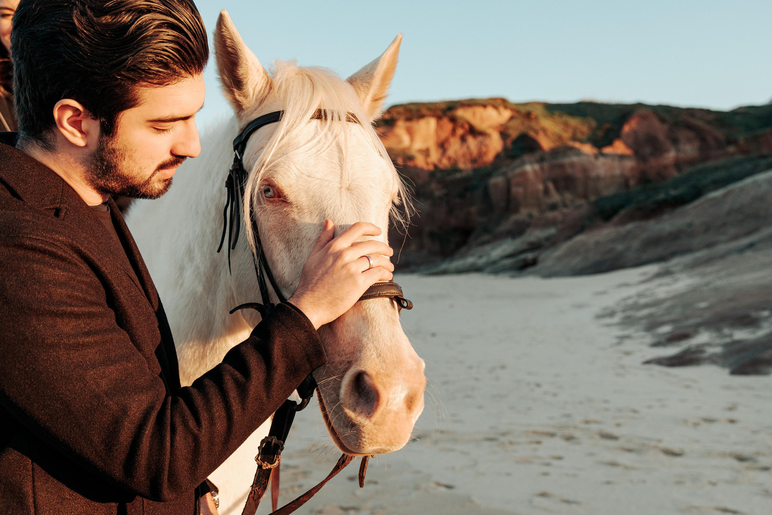 Photo session on horseback at Praia da Almagreira. Luxury Wedding Photography & Cinematic Films | Portugal & Destination Weddings | Ricardo & Mary Pictures