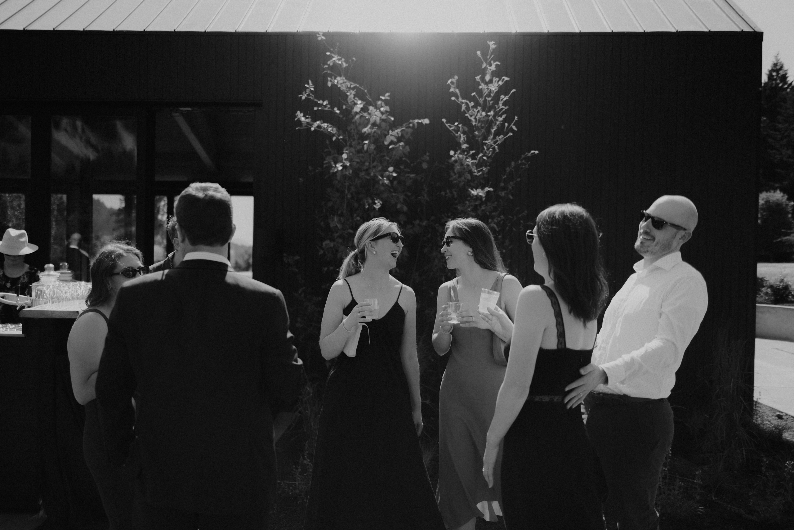 Candid guest moments during a Wind Mountain Ranch wedding