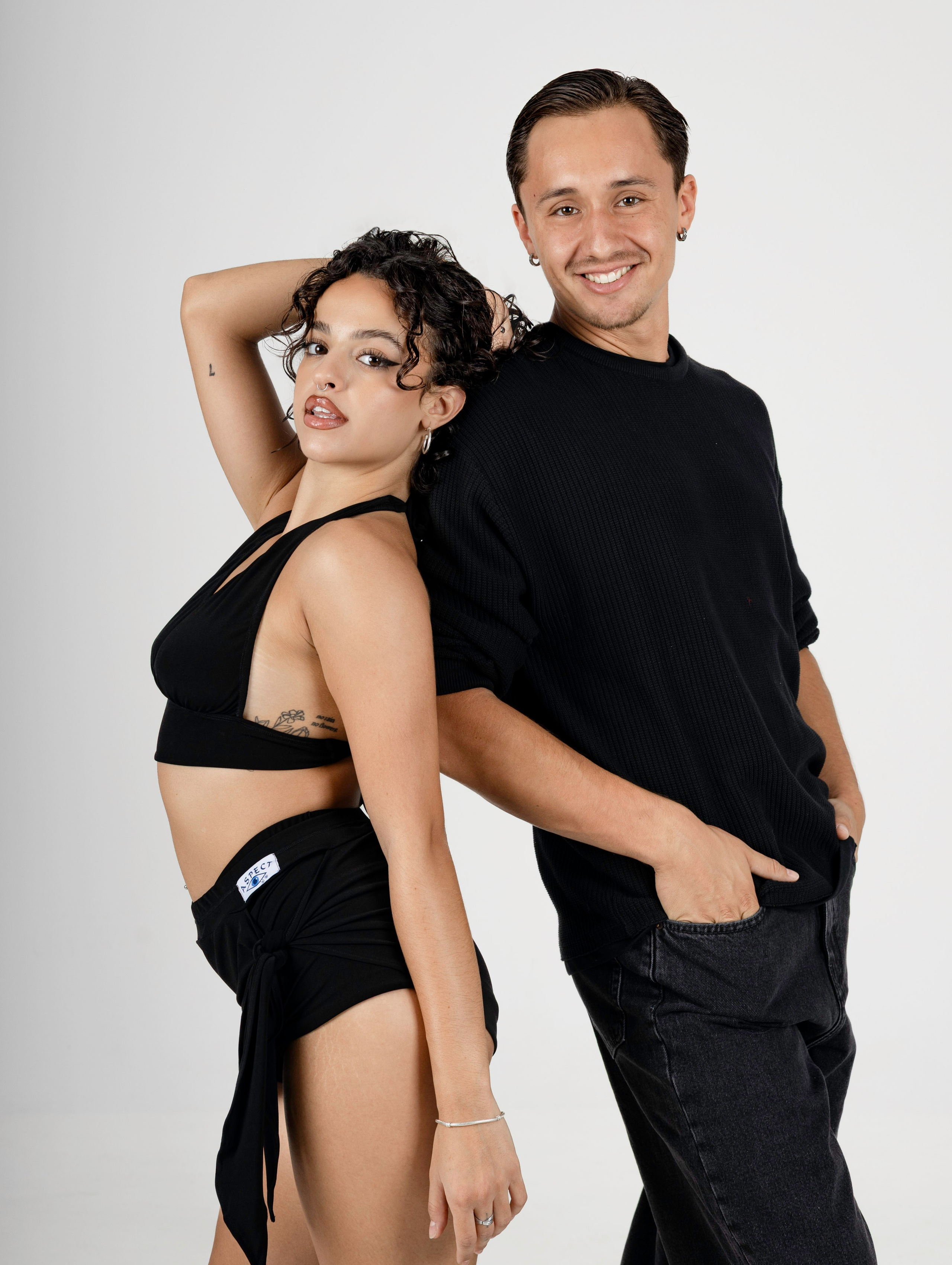 Salsa instructors posing together during a studio branding photoshoot