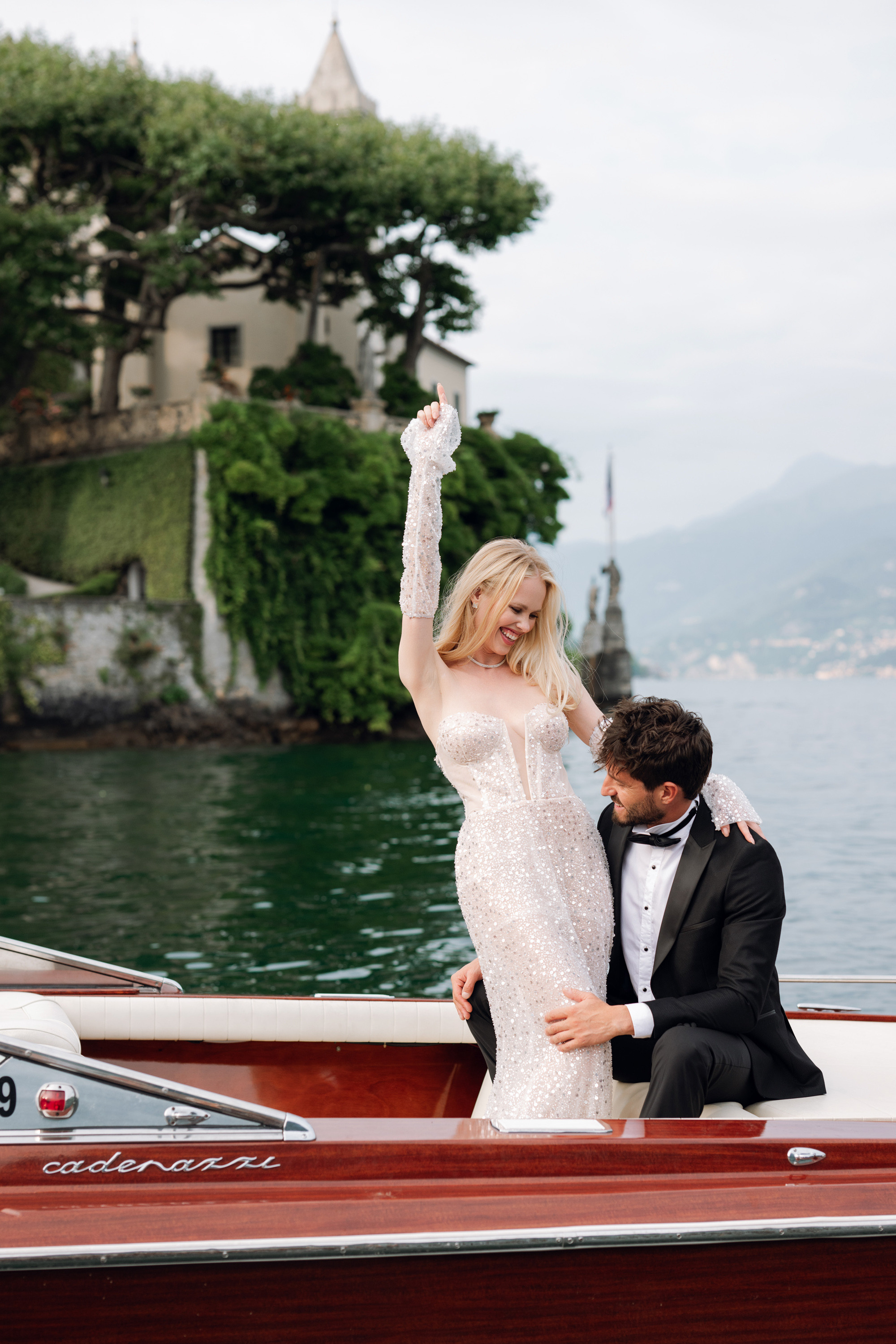 a bride and groom in a boat