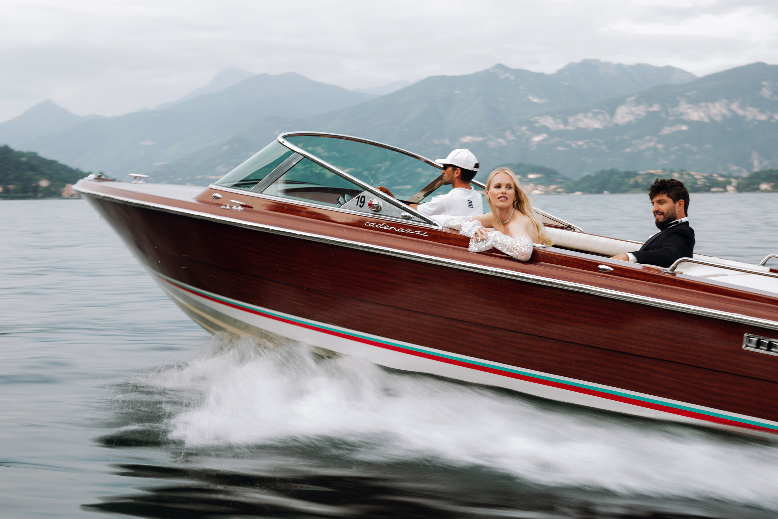 a couple riding in a boat on the water
