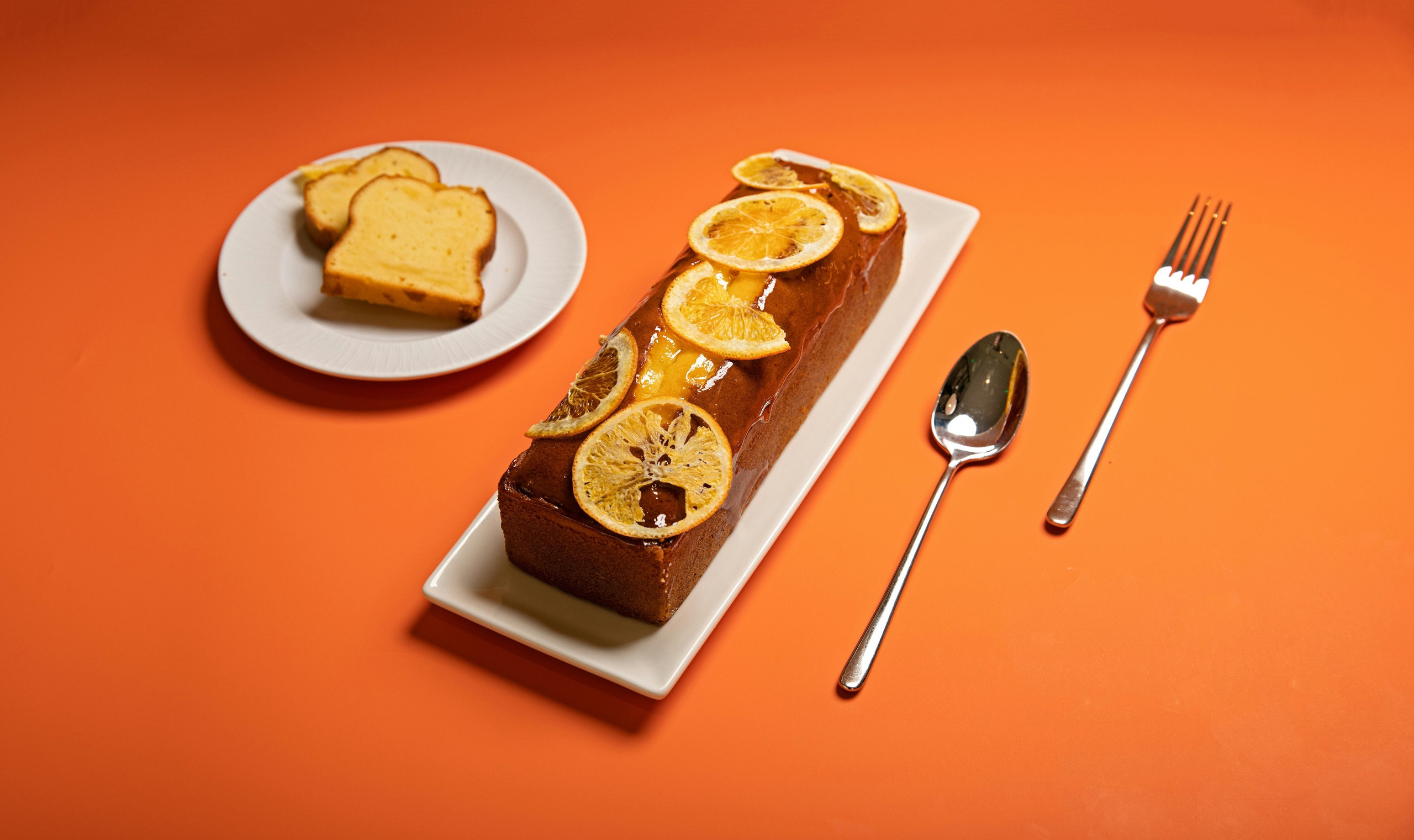 Studio food photography of sushi platter on orange background, photographed by Jay Soundo for Japanese restaurant content.