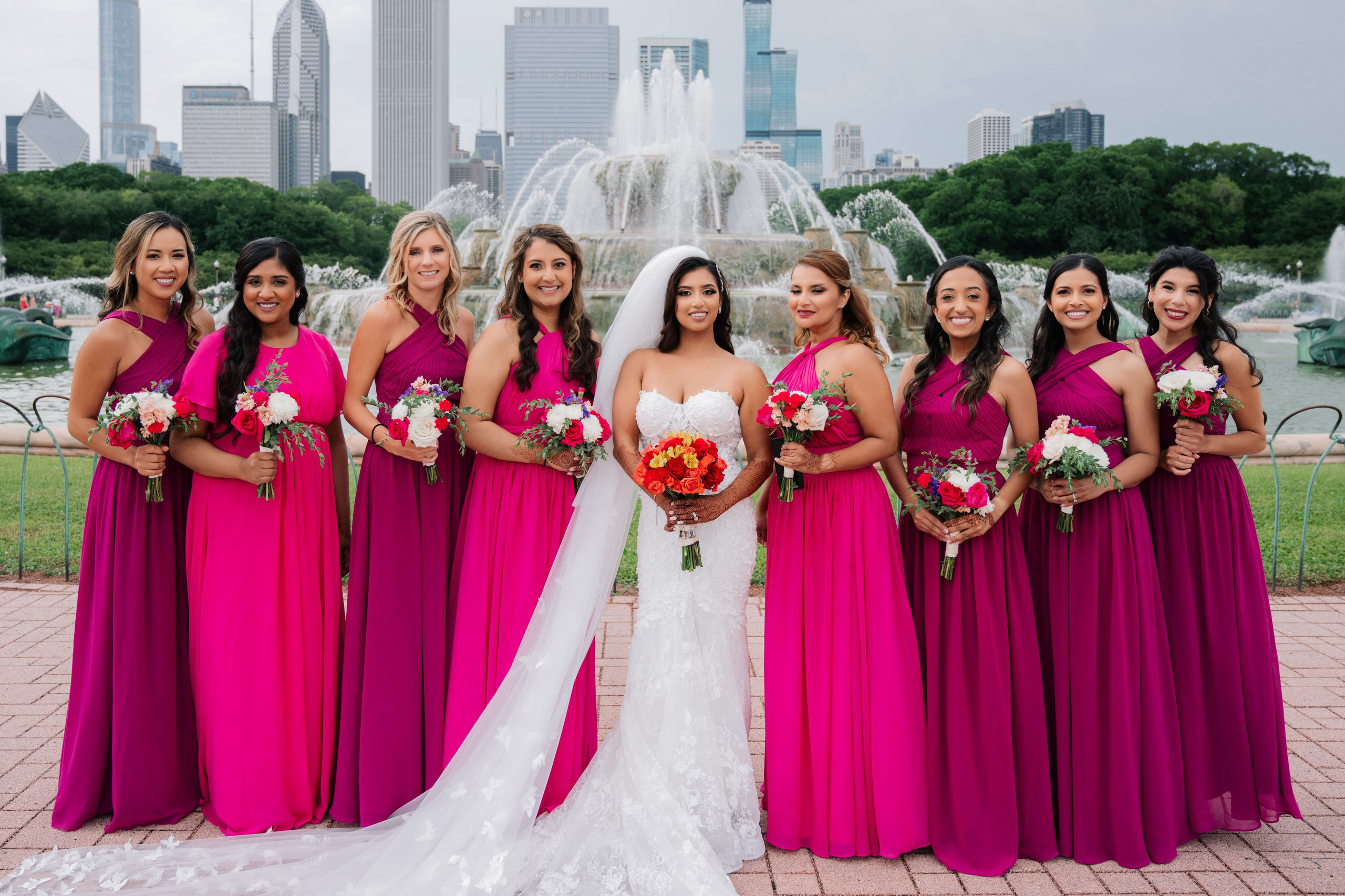 bridesmaids in front of the fountain