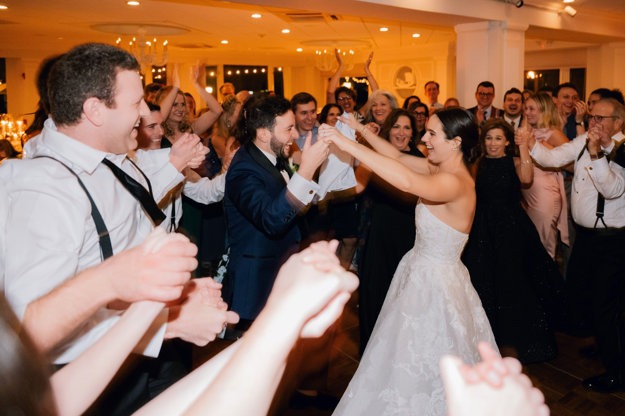 a bride and groom dancing at a wedding reception