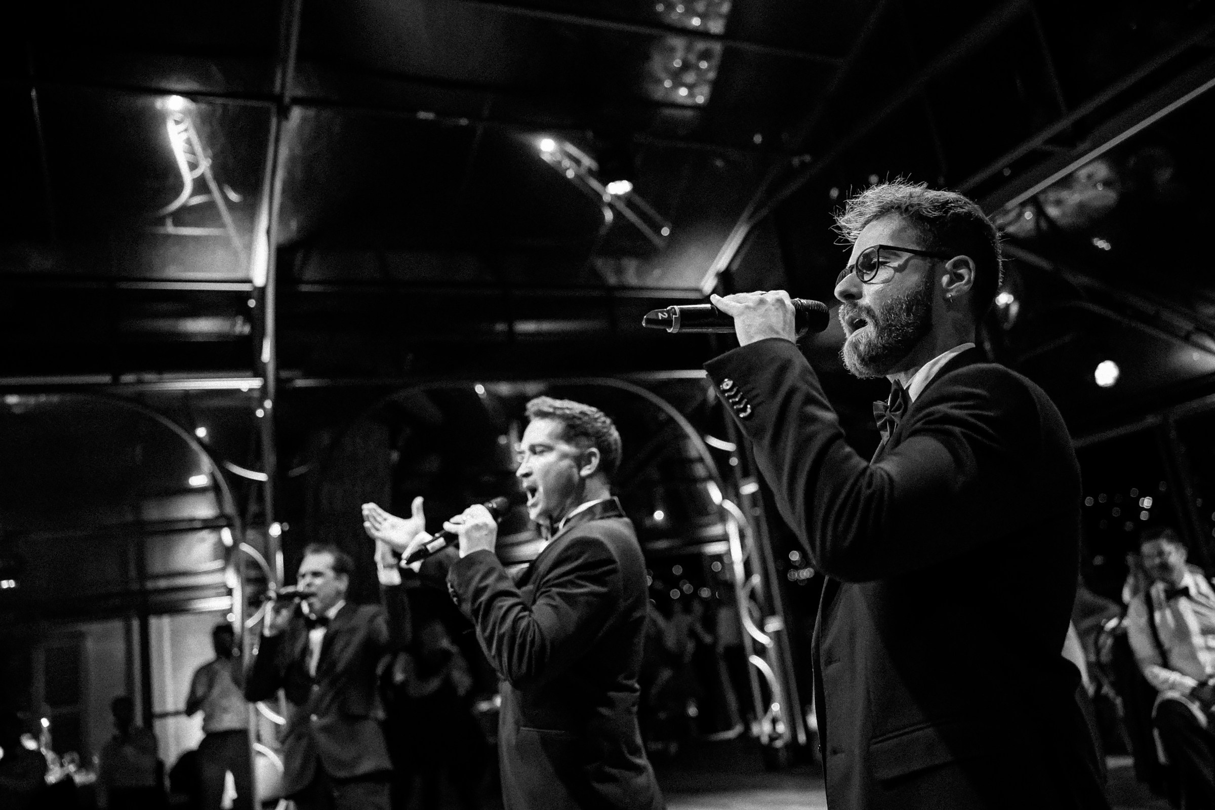 Talented vocalists performing live, energizing the sophisticated wedding celebration.