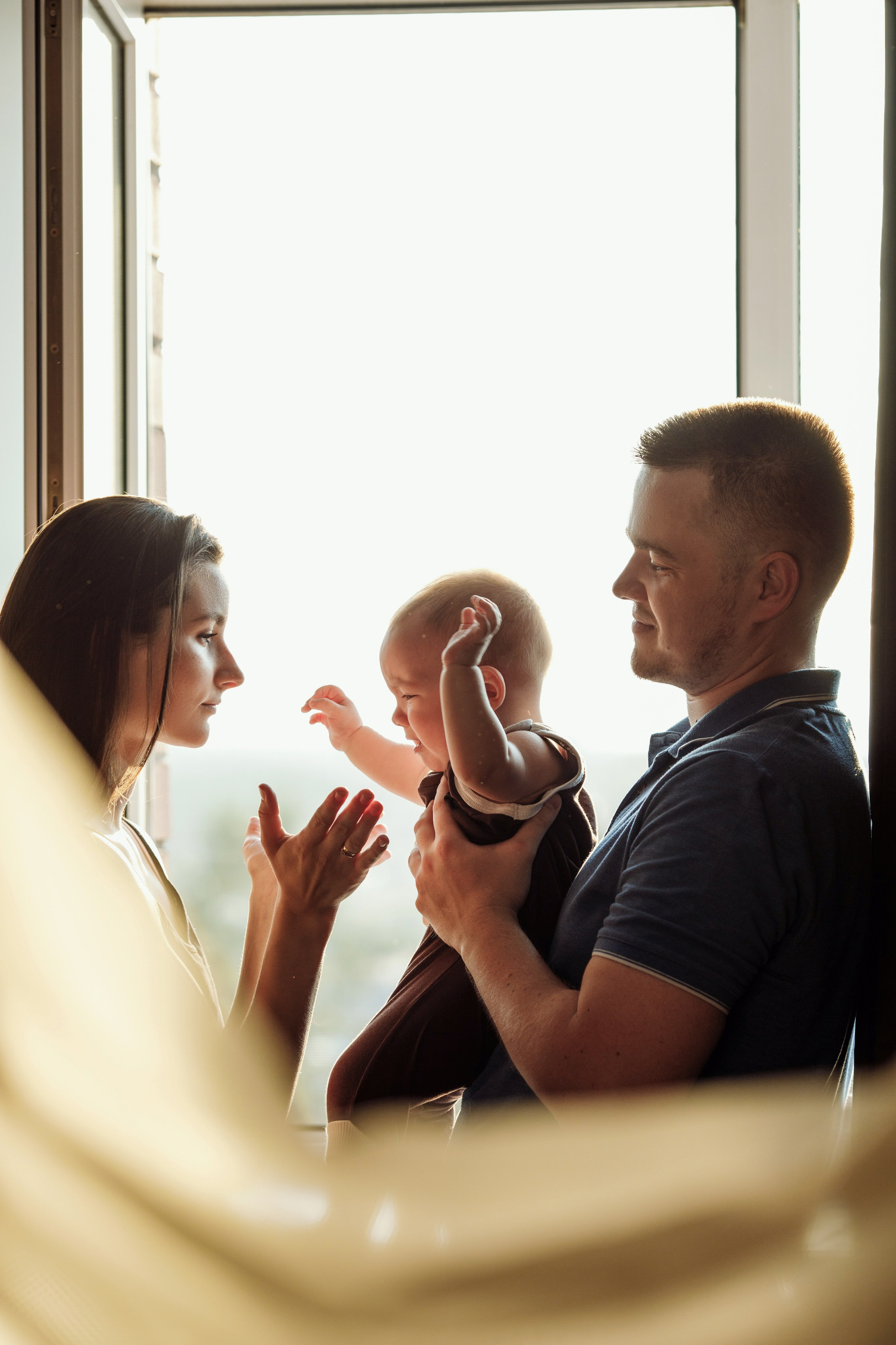 Adorable baby portraits capturing curiosity and first smiles in a natural home setting. Alisa Tant — Family and newborn photographer Bucks County, Montgomery county, Philadelphia, NJ