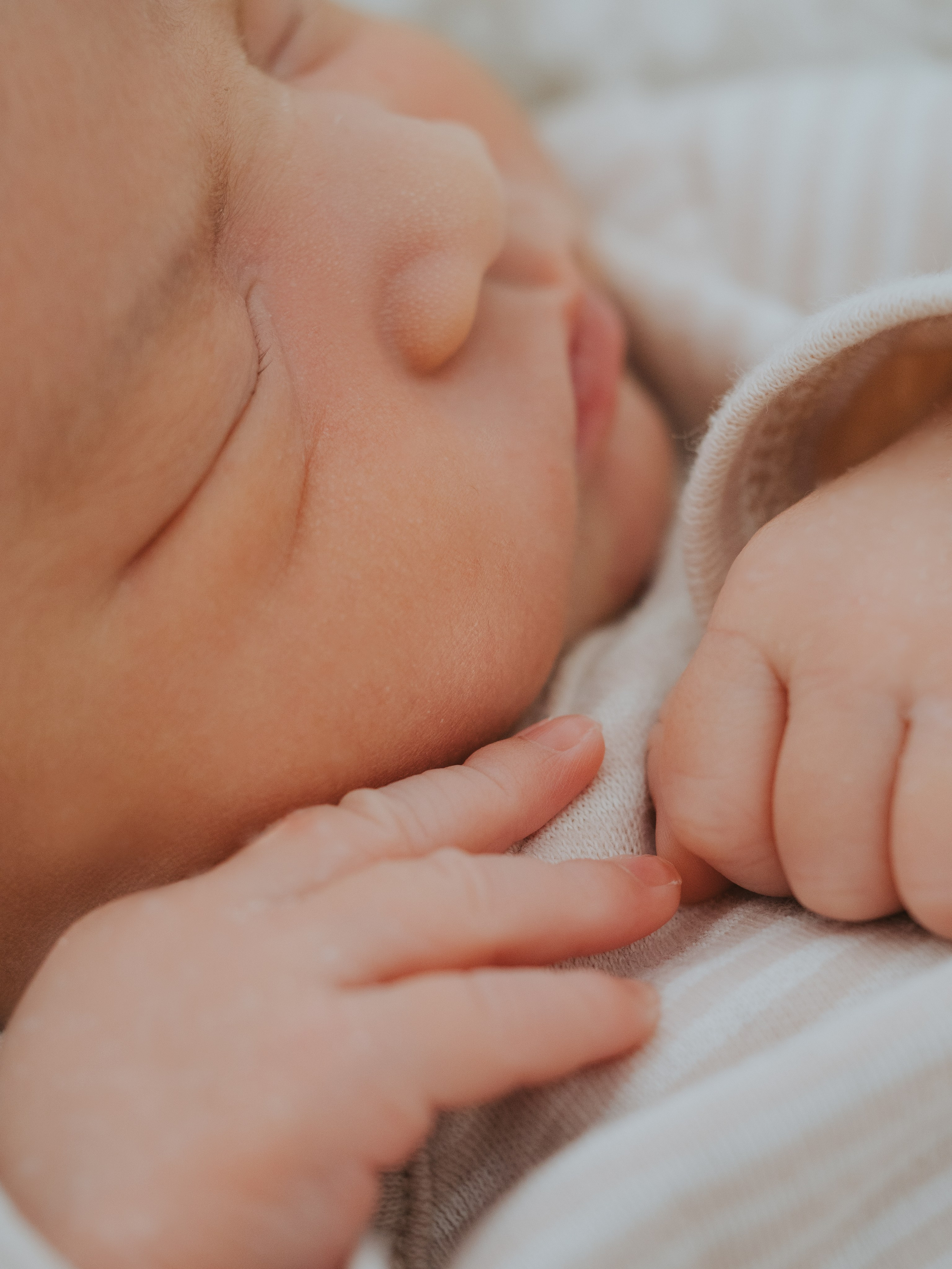 Close up details of hands of newborn.
