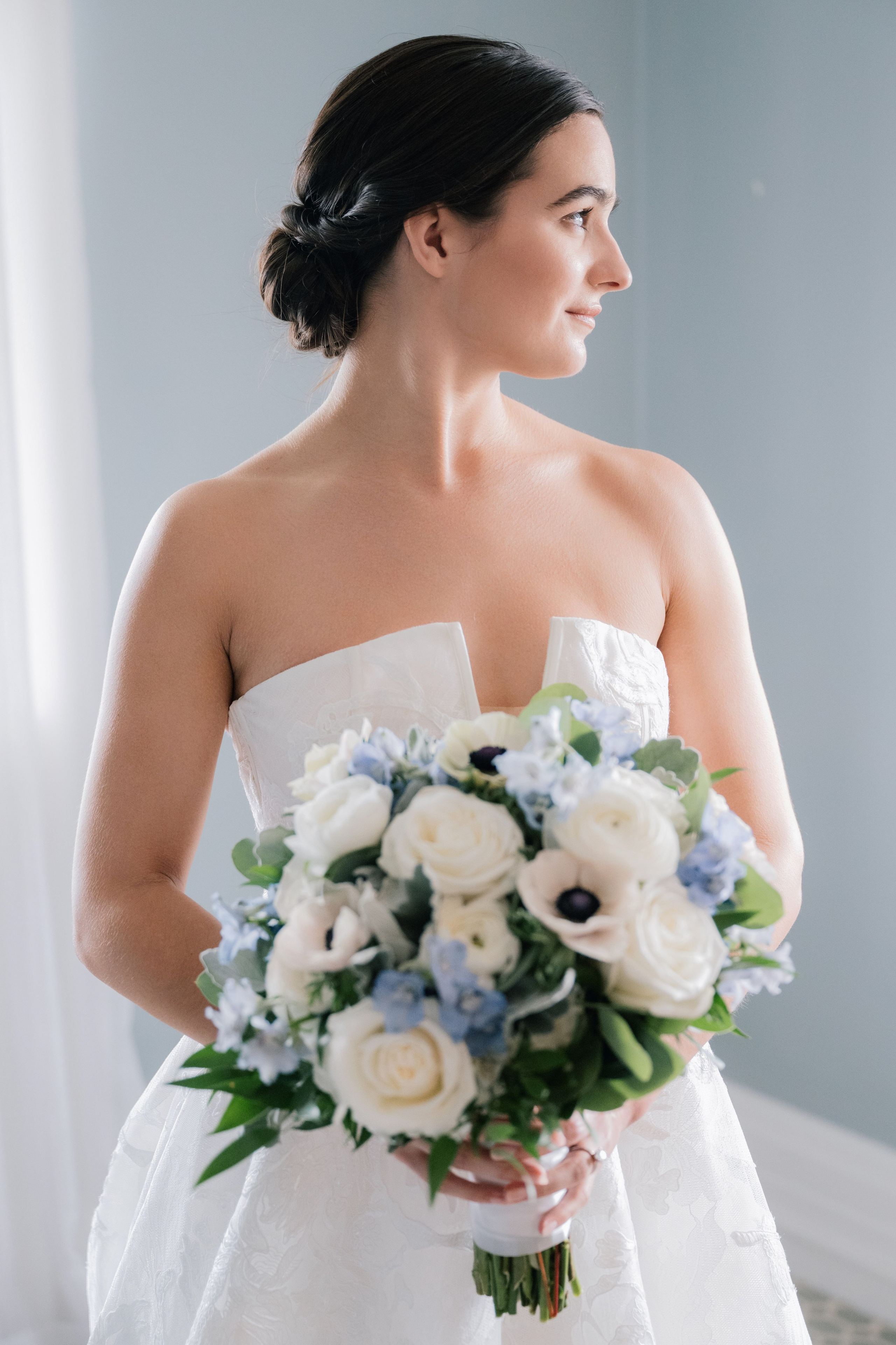 a bride holding her bouquet in her hands