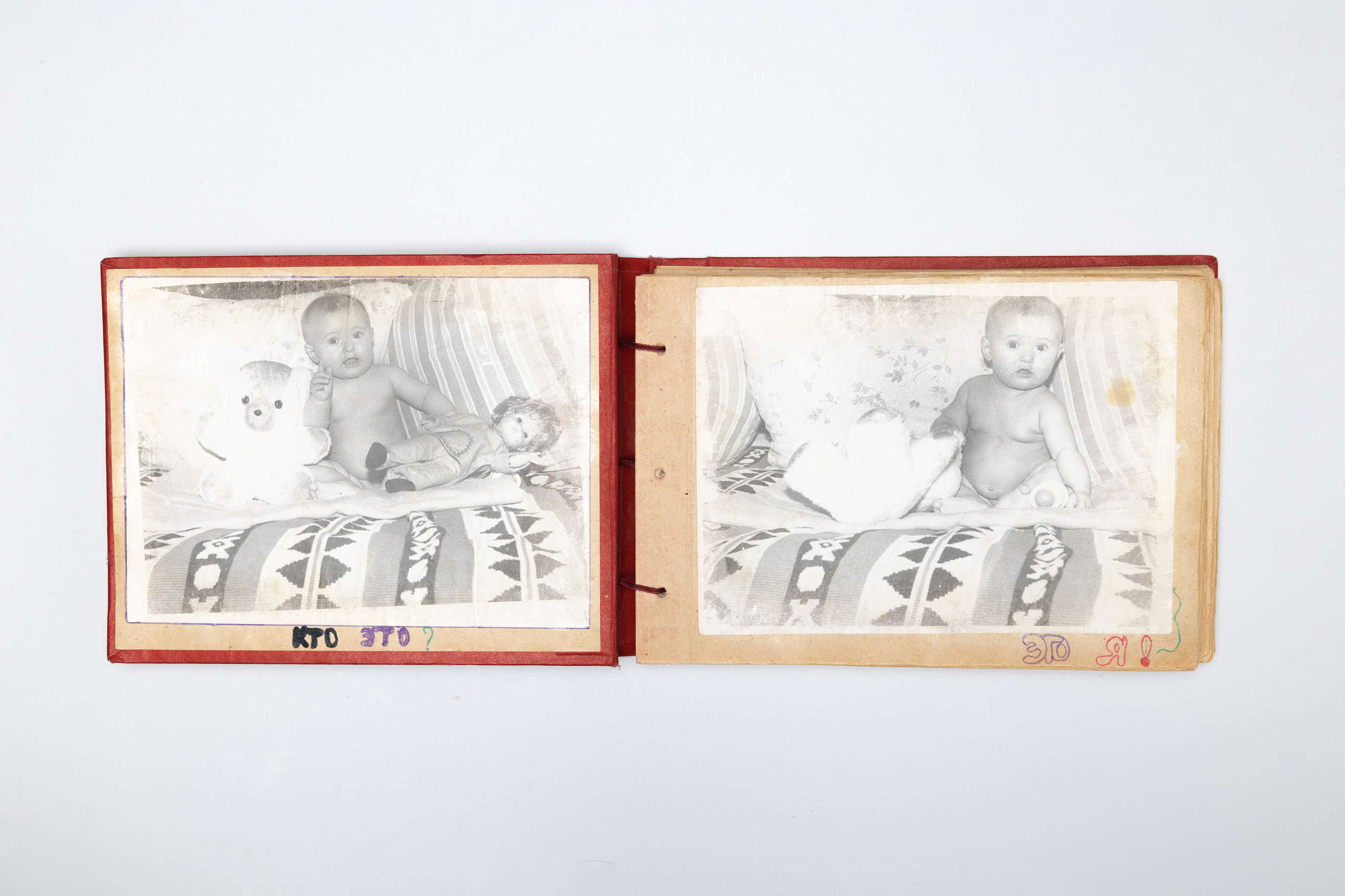 The photographs show me. As a child, I wrote under the photos "who is this?" "It's me".