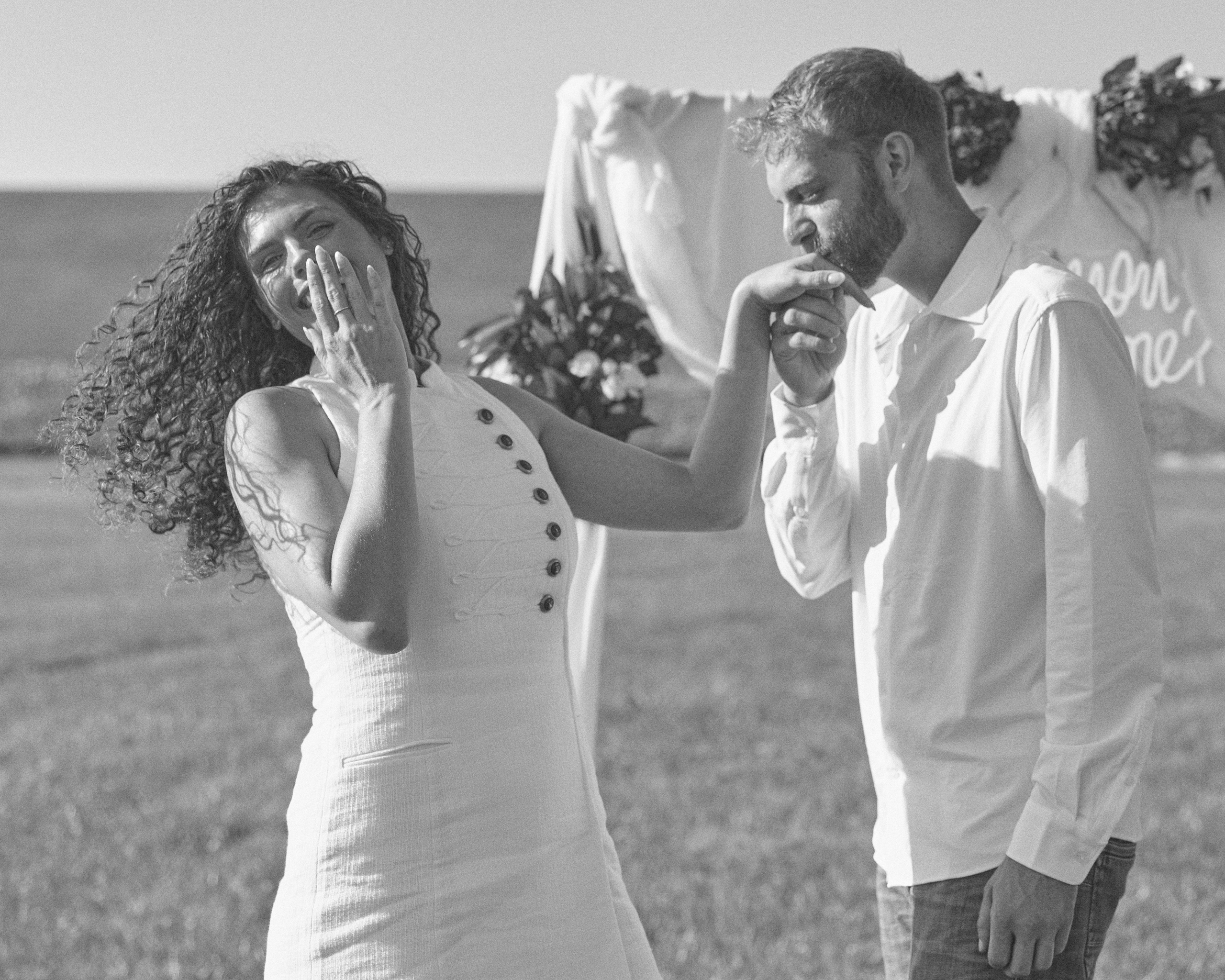 Black and white emotional moment as she covers her face at Alum Creek, Ohio