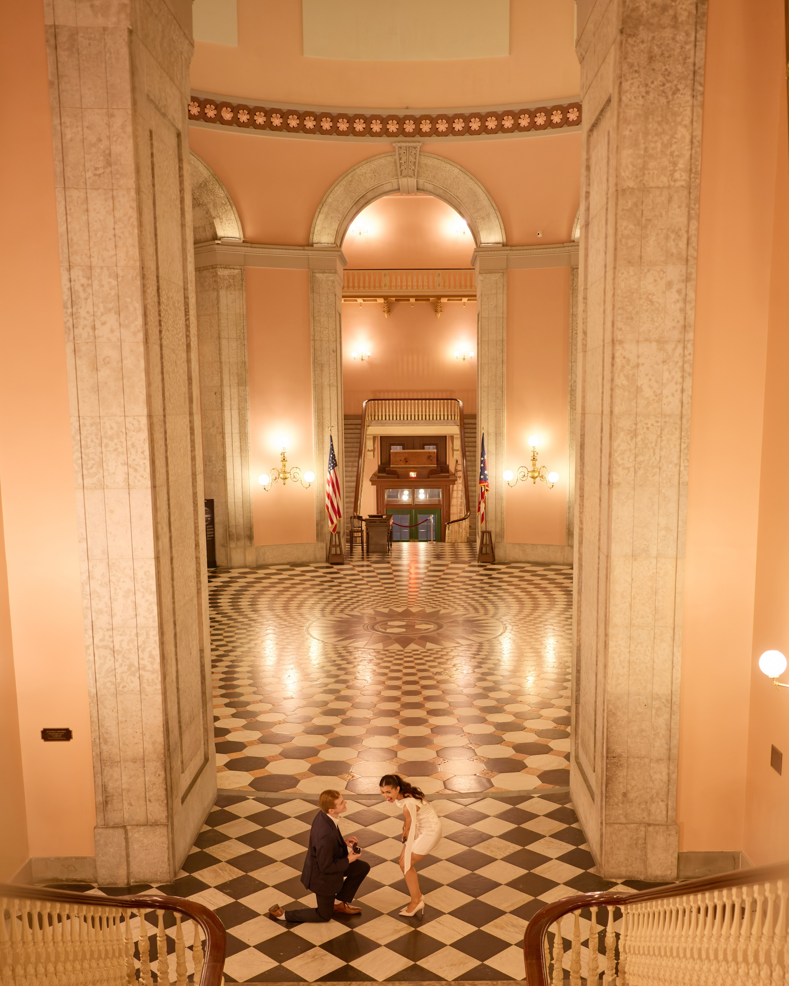 Wide proposal scene in the grand hall of the Ohio Statehouse in Columbus, Ohio