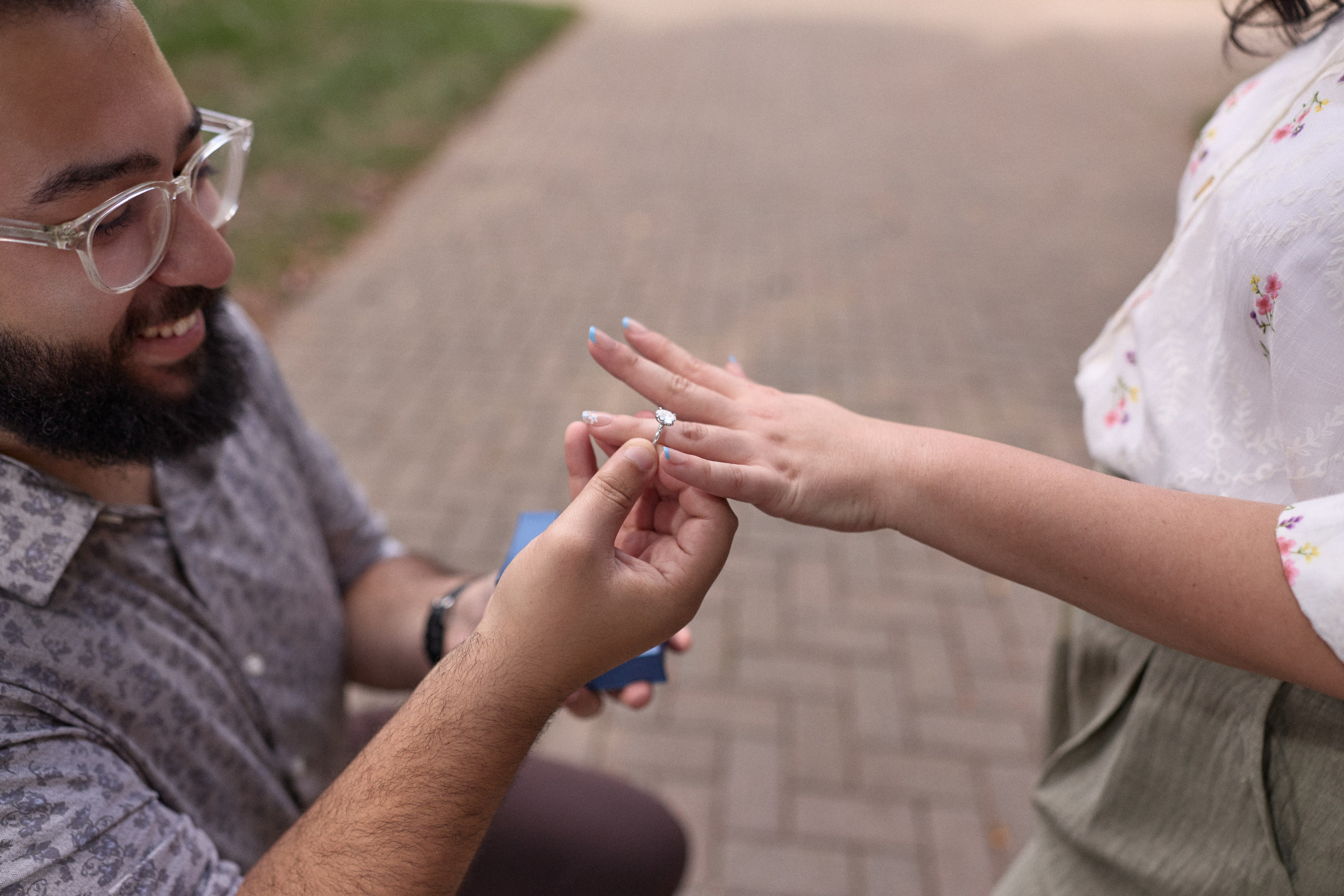 Close-up of the ring exchange on a brick campus path at Capital University in Columbus, Ohio