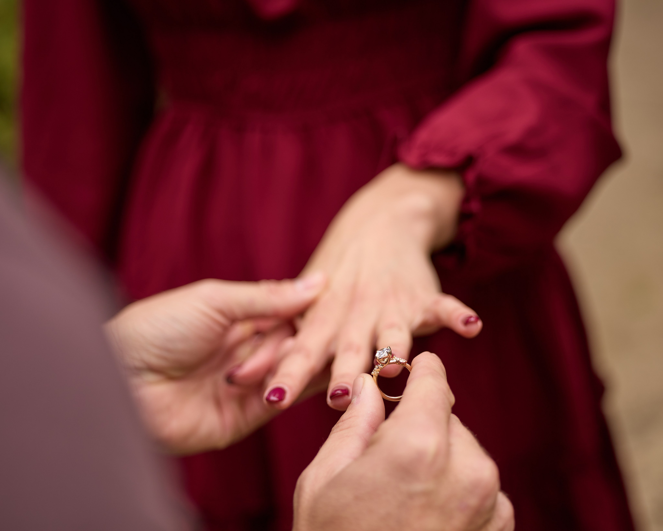Detailed close-up of the engagement ring on her finger at Inniswood Metro Gardens, Ohio