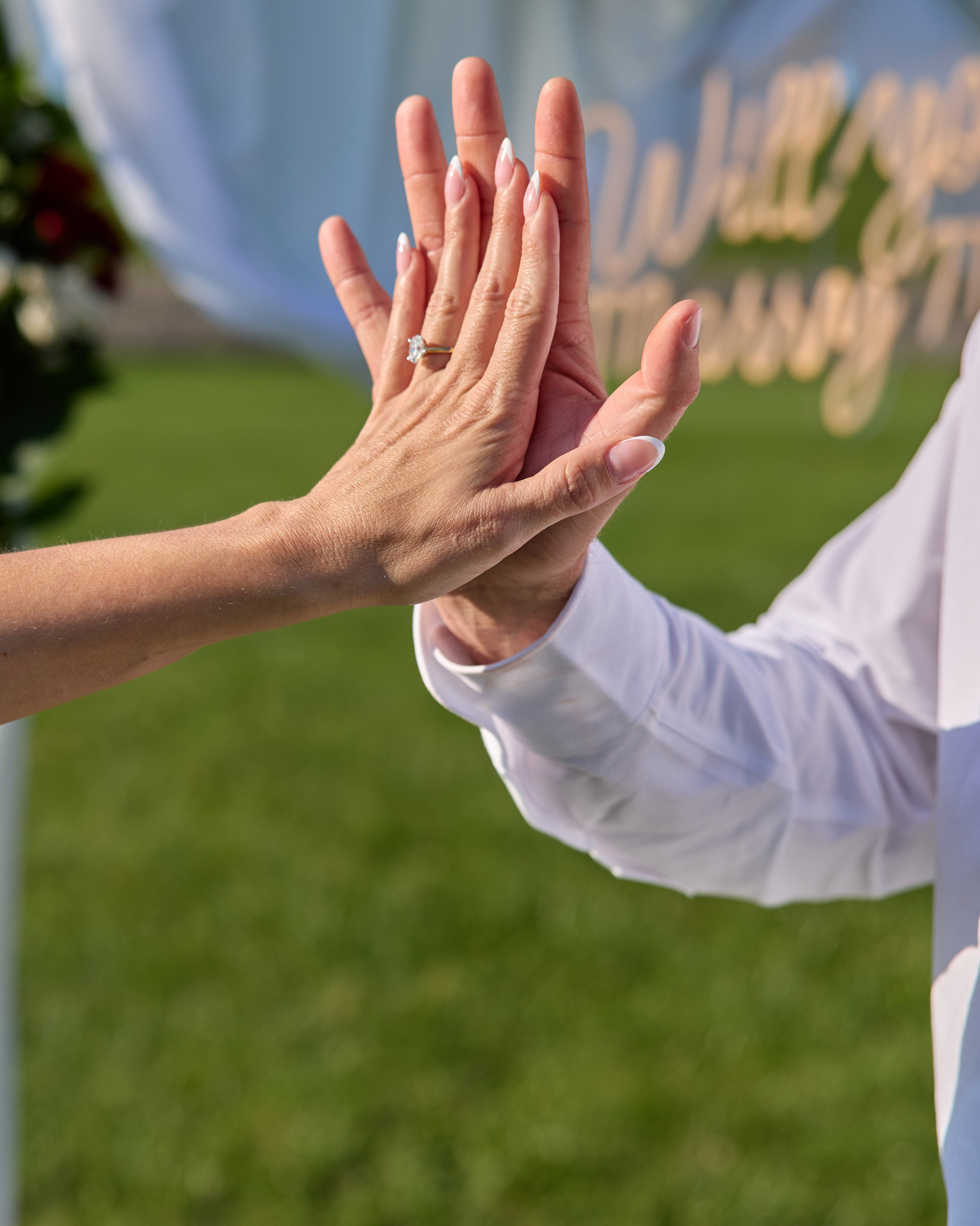 Celebration high-five under the arch at Alum Creek, Ohio