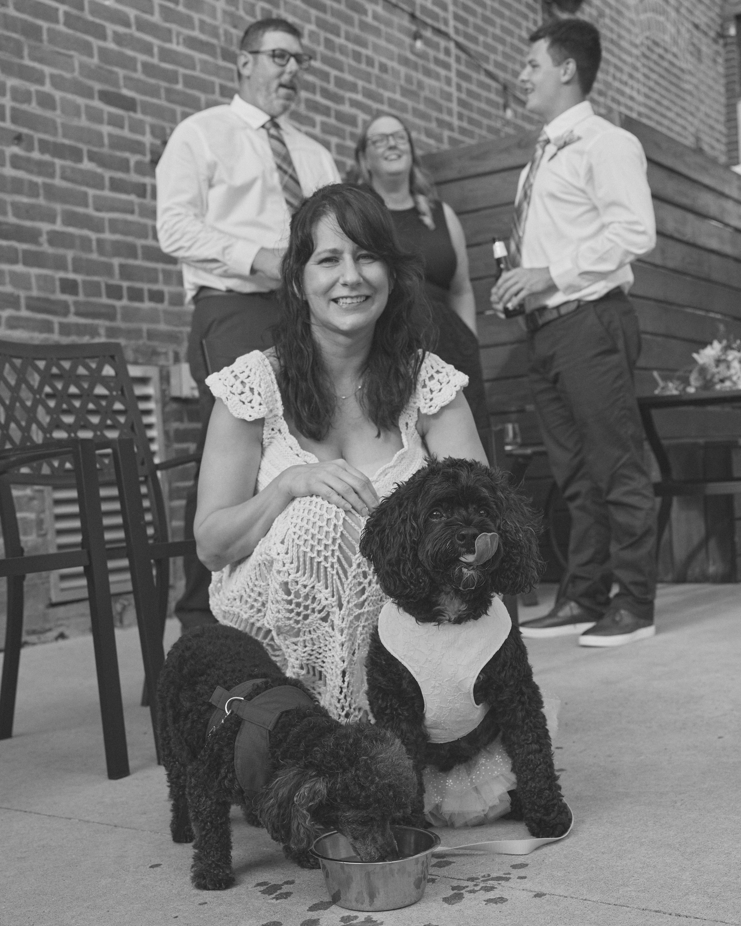 Intimate wedding photography of newlyweds celebrating with family