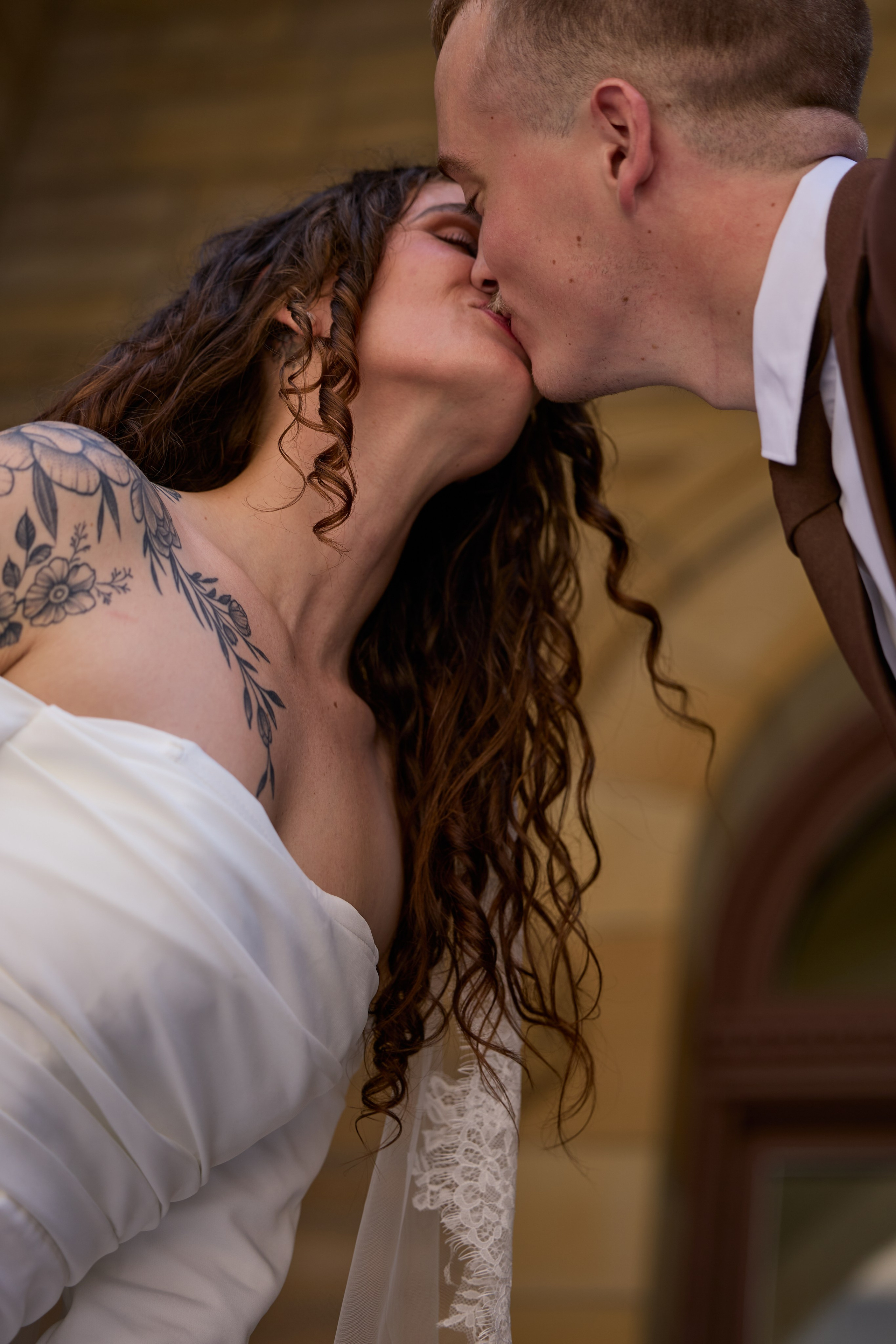Bride and groom sharing a candid moment during their micro wedding