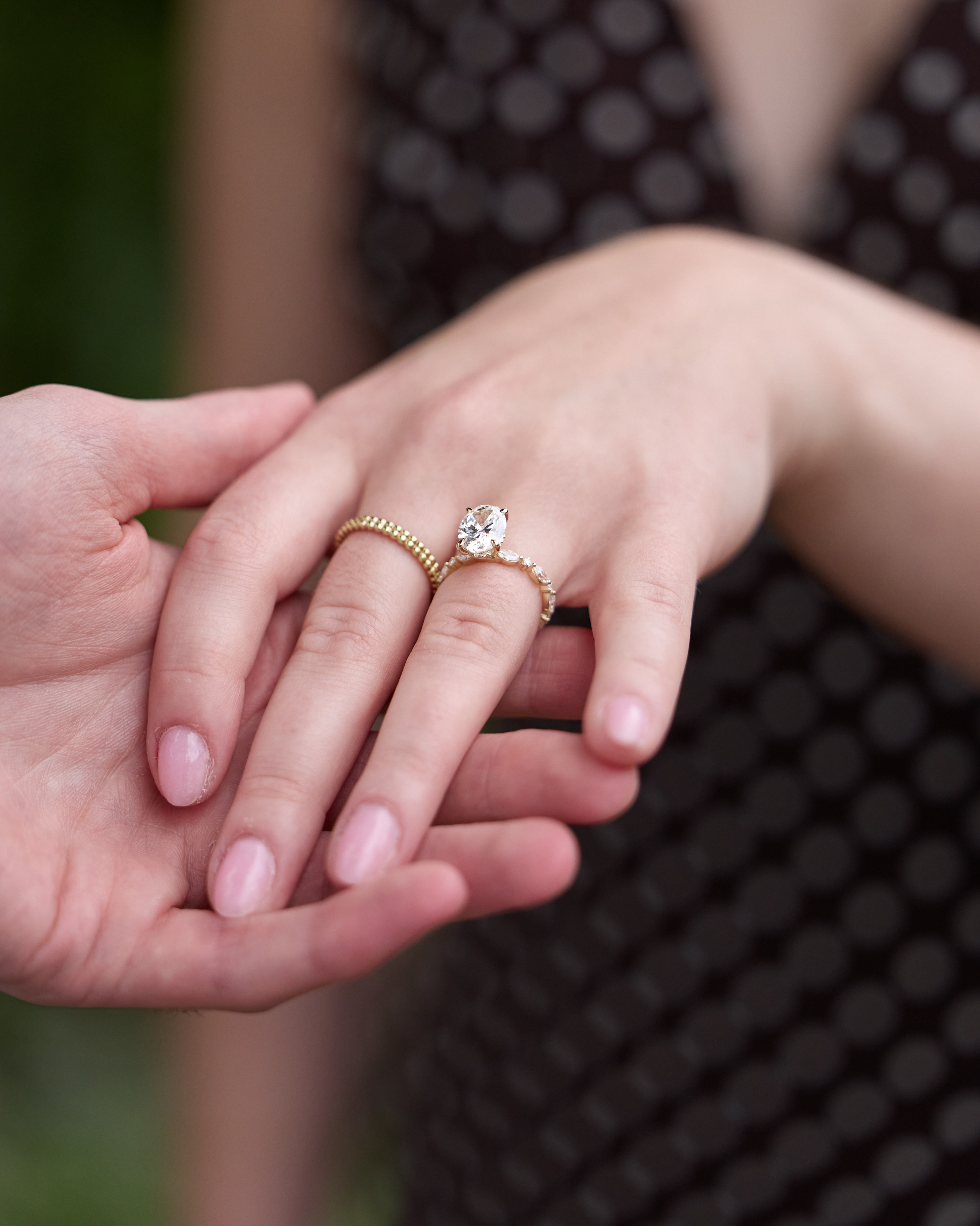 Wide proposal scene under a garden pergola at Inniswood Metro Gardens, Ohio