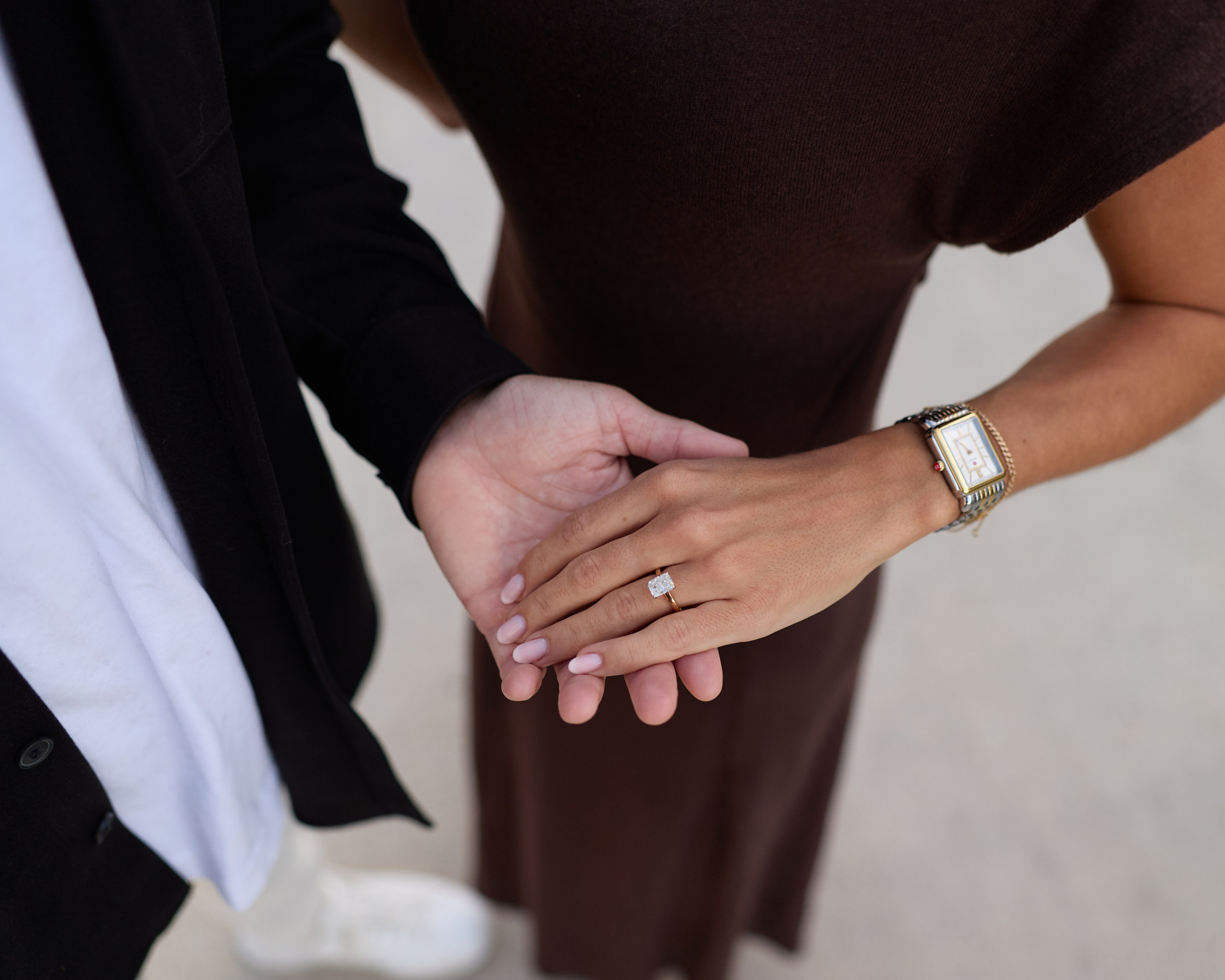 Close-up of hands with the new engagement ring on the Dublin Link Bridge in Ohio