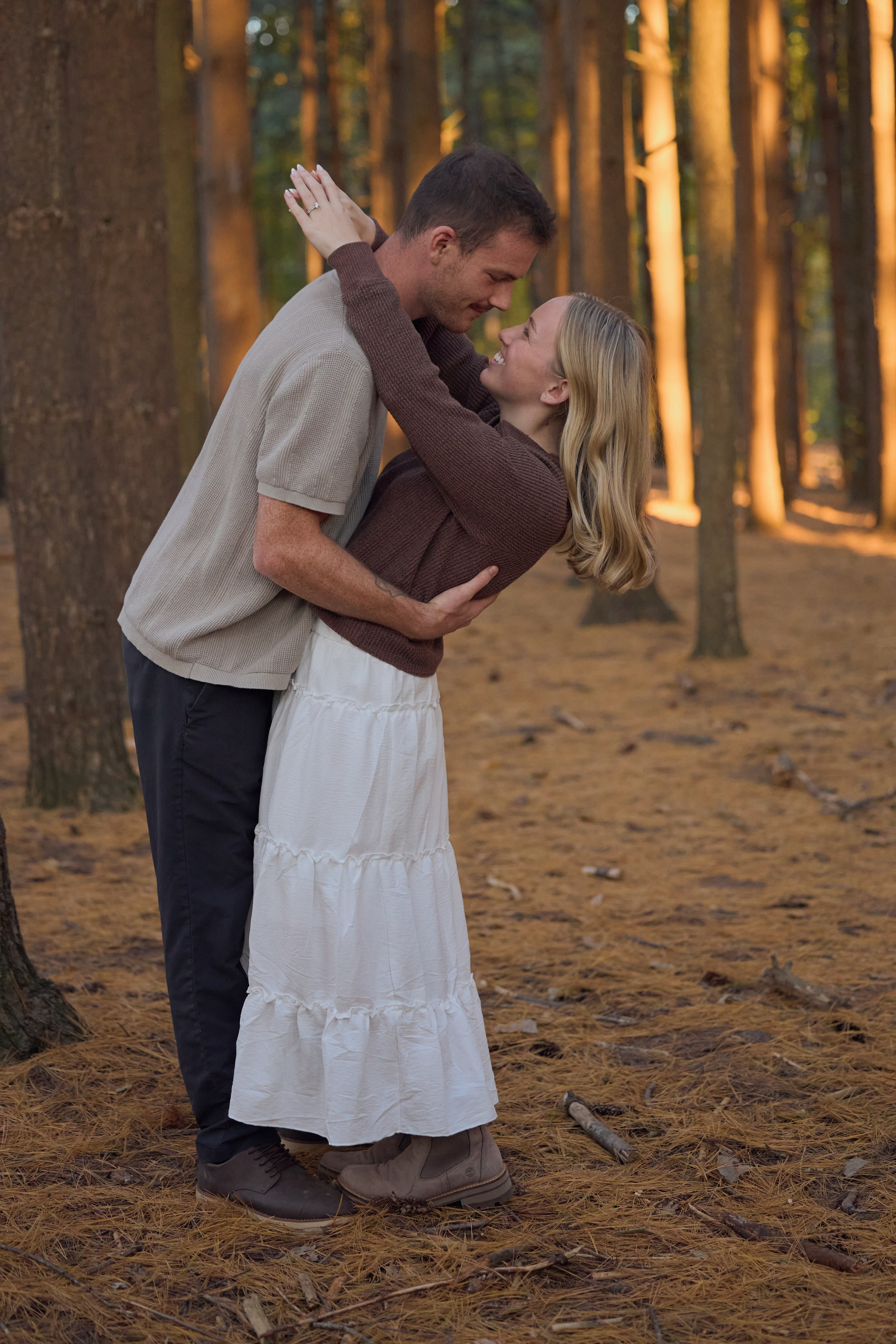 Couple walking through the woods at sunset near Hoover Dam