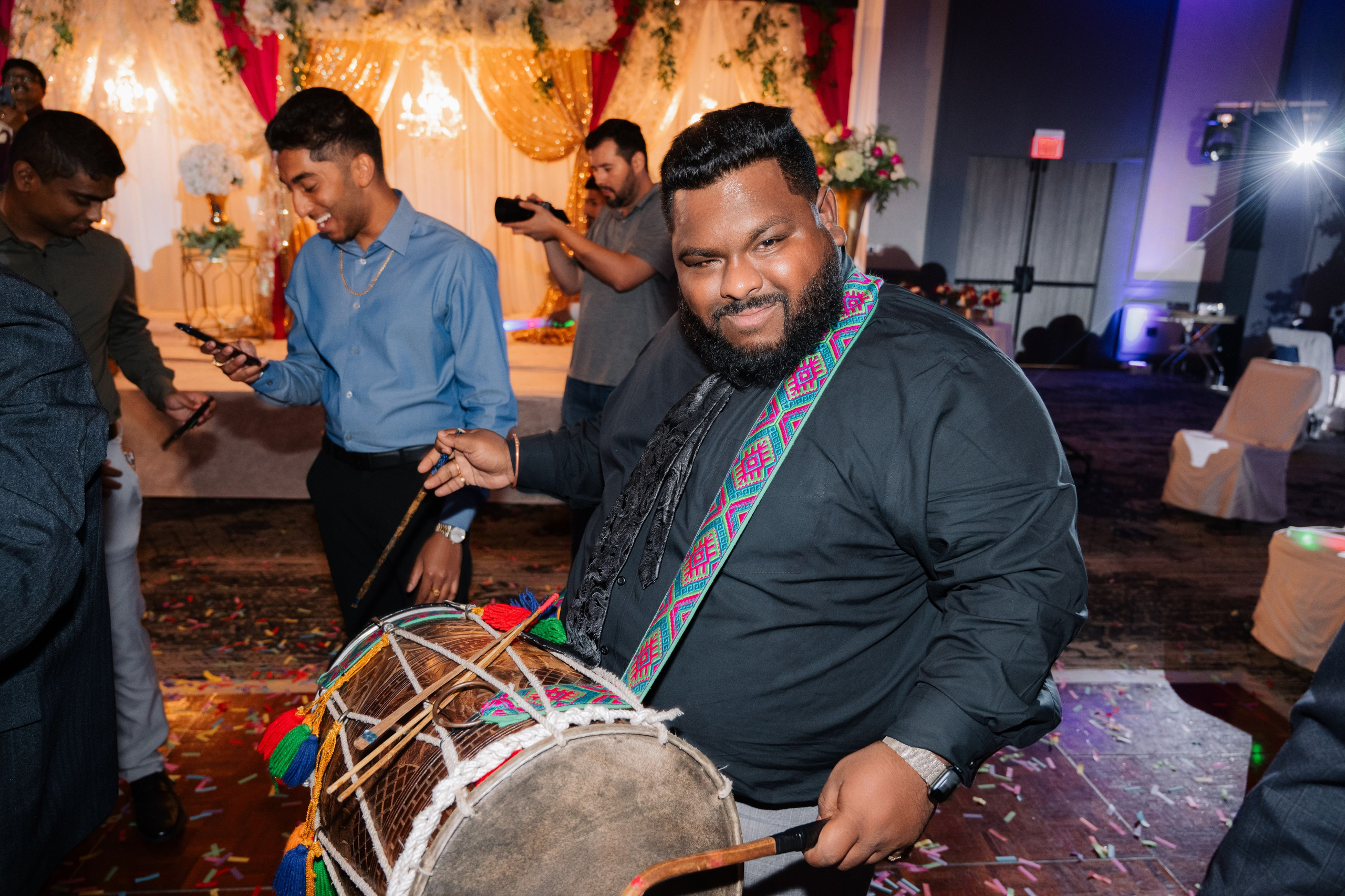 a man playing a drum