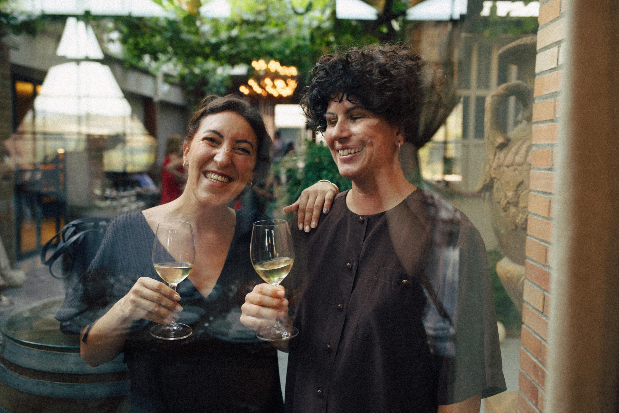 Candid moment of laughter during a tasting dinner at Gramona