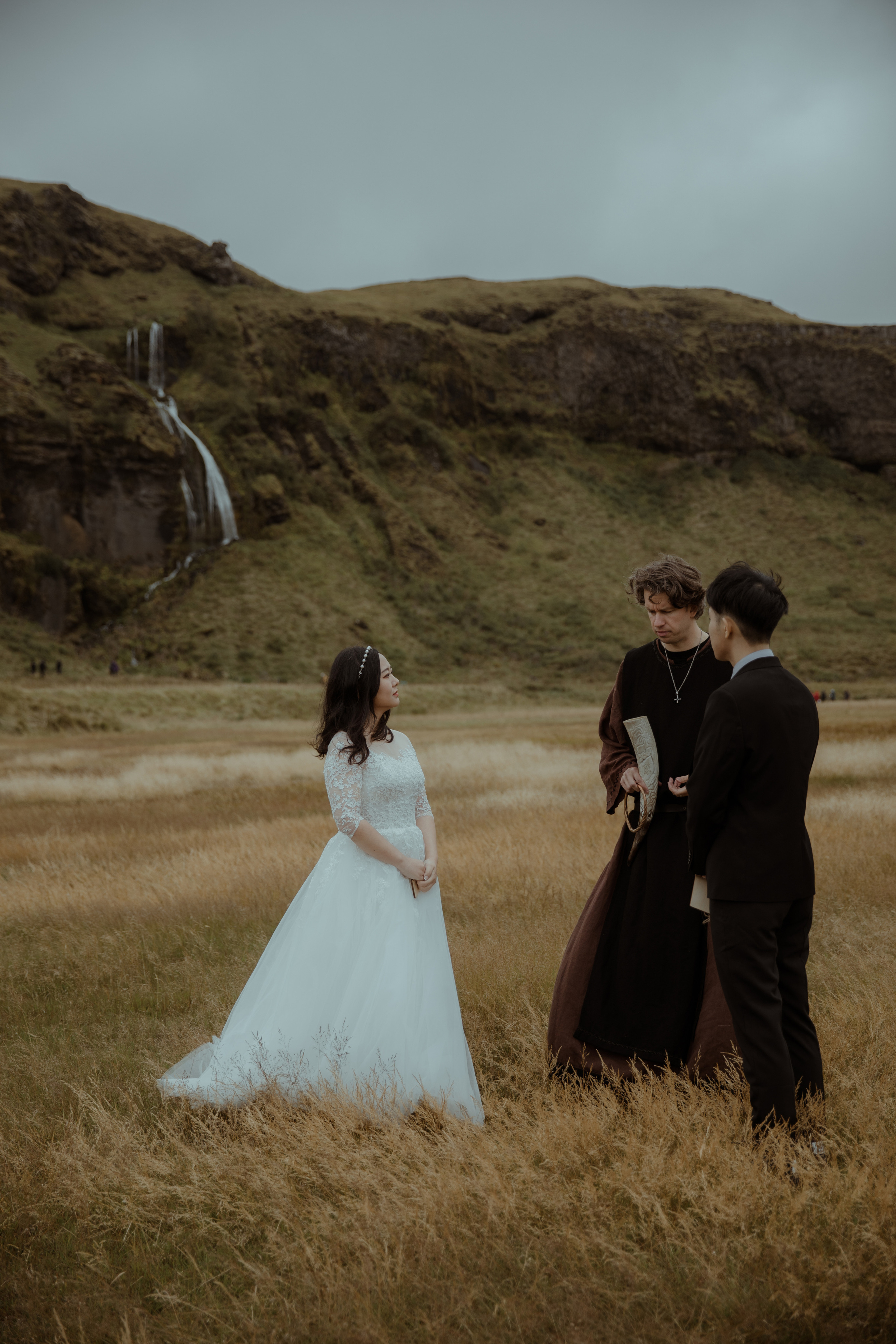 Elopement at Seljalandsfoss waterfall in Iceland. Iceland elopement photographer & videographer
