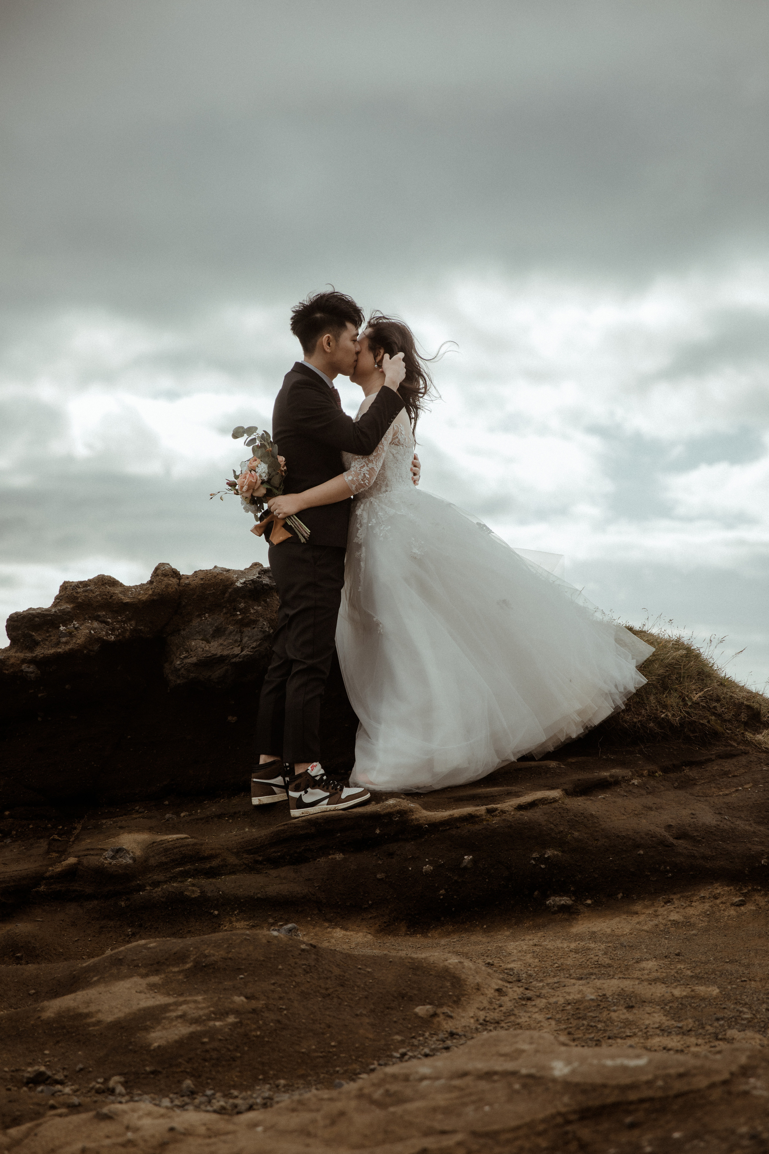Elopement at Seljalandsfoss waterfall in Iceland. Iceland elopement photographer & videographer
