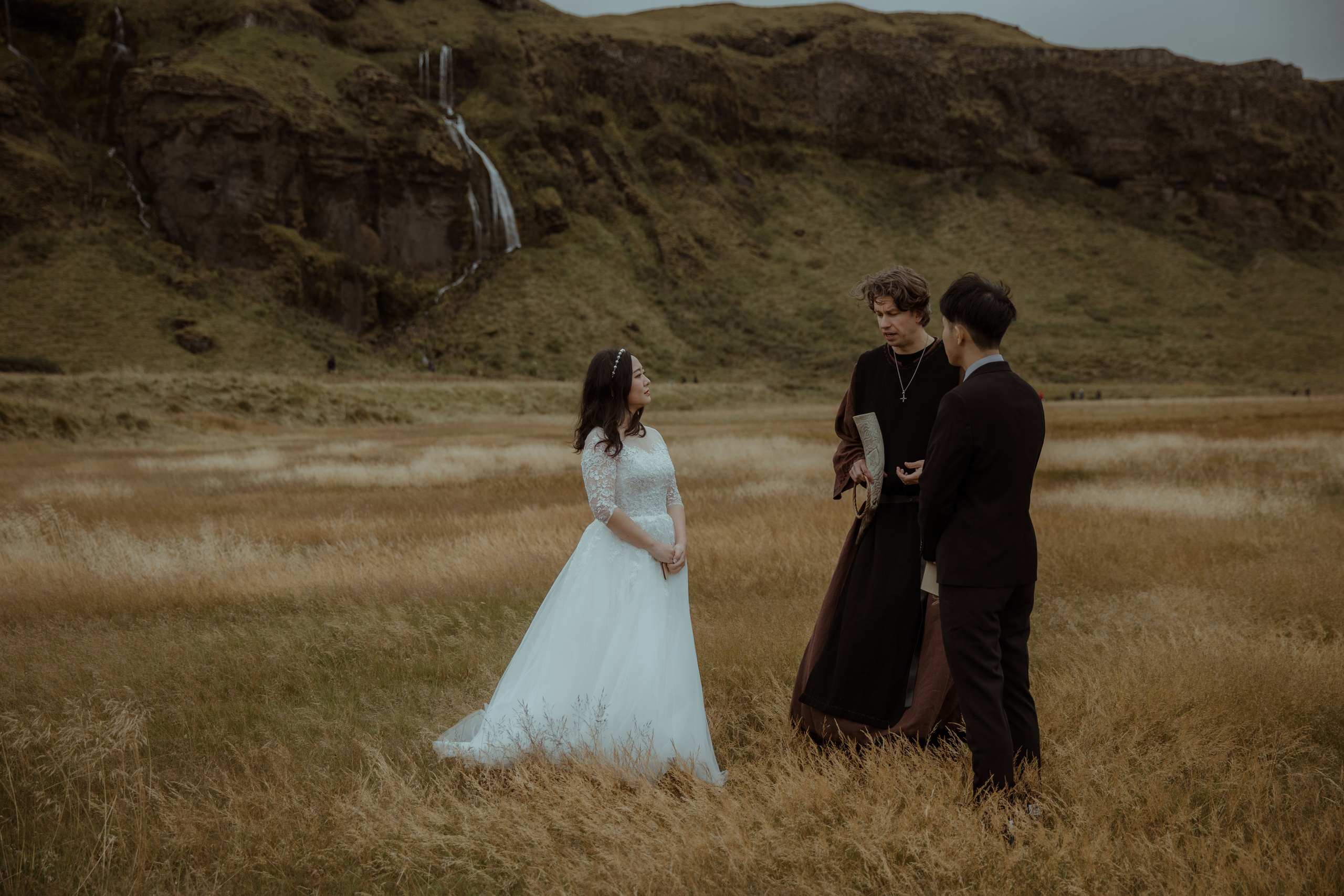 Elopement at Seljalandsfoss waterfall in Iceland. Iceland elopement photographer & videographer