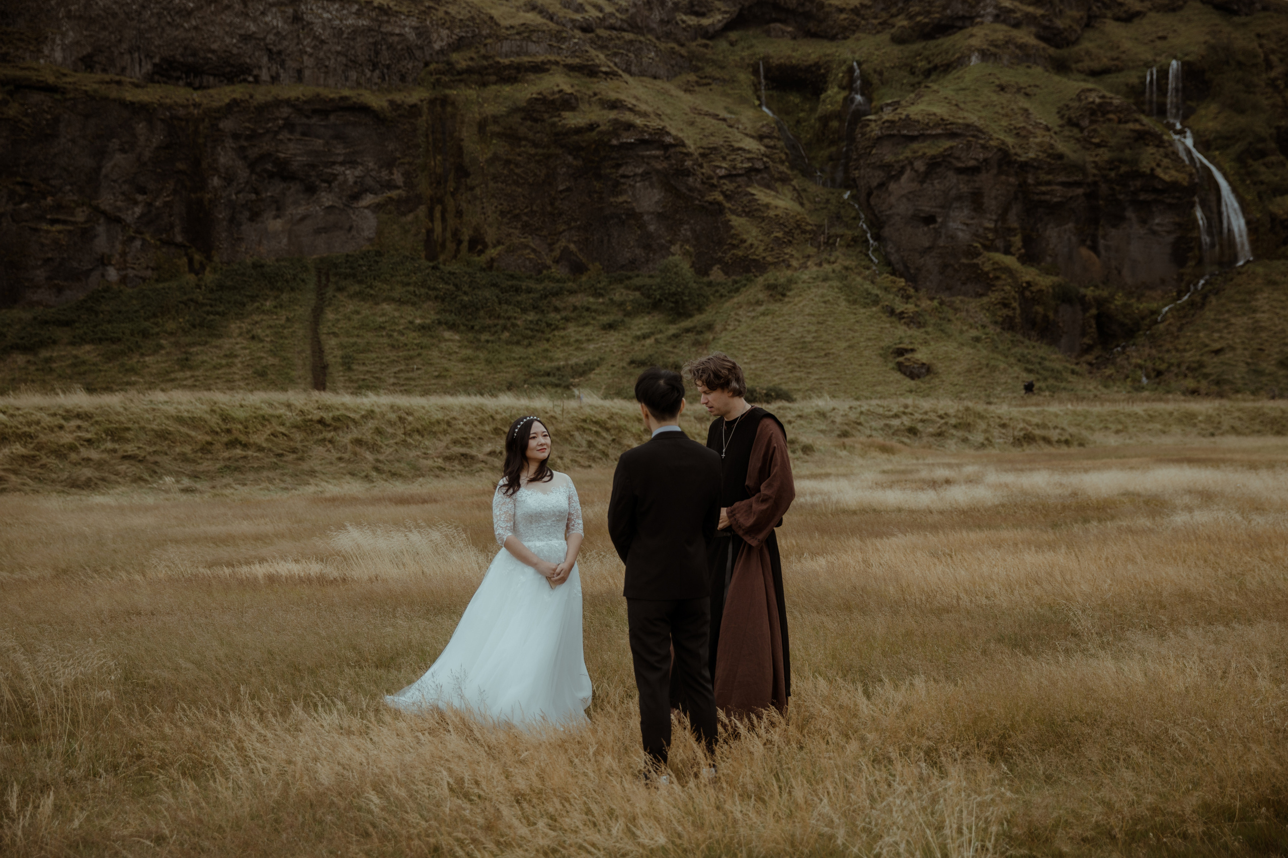 Elopement at Seljalandsfoss waterfall in Iceland. Iceland elopement photographer & videographer