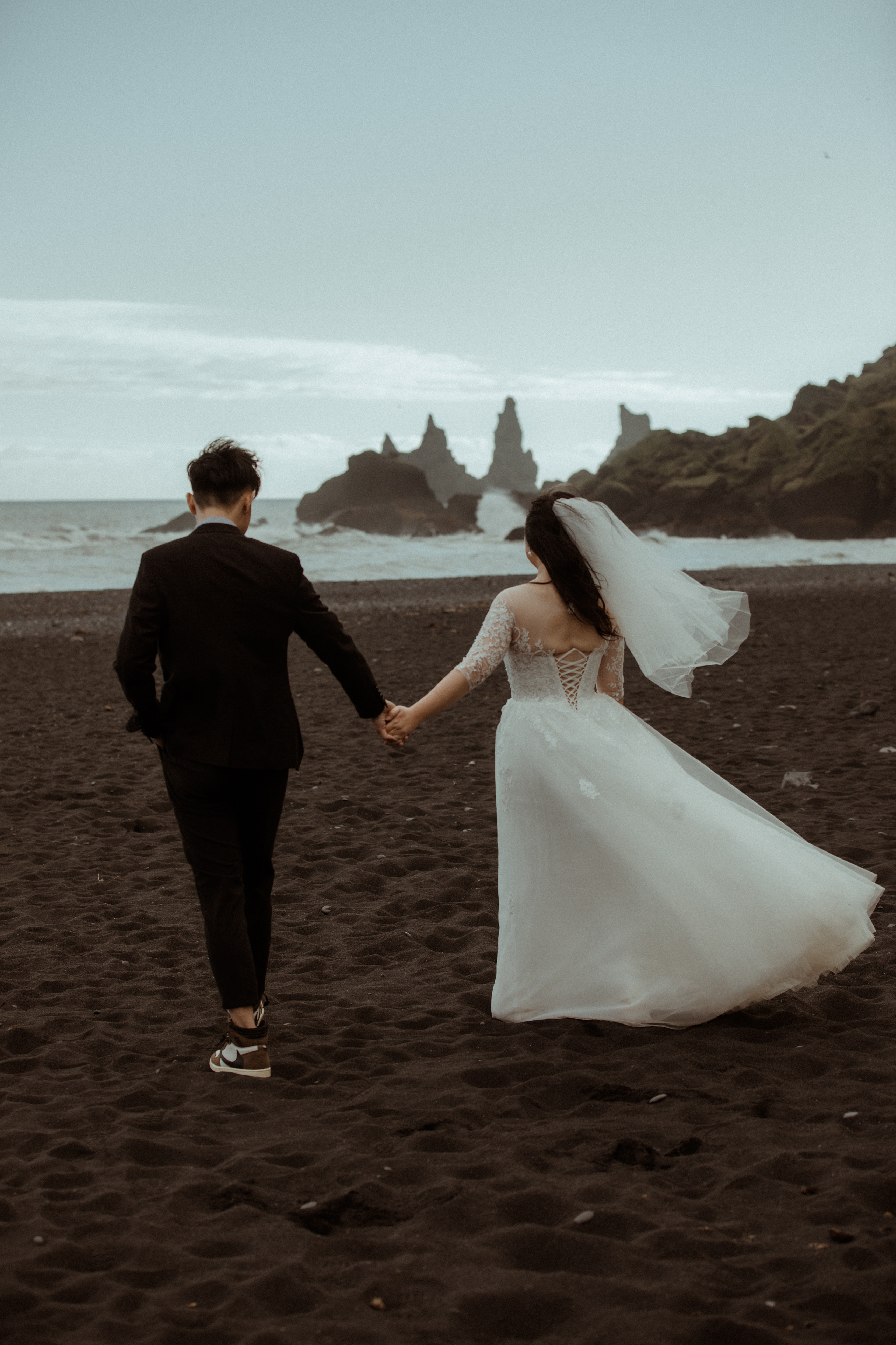 Elopement at Seljalandsfoss waterfall in Iceland. Iceland elopement photographer & videographer