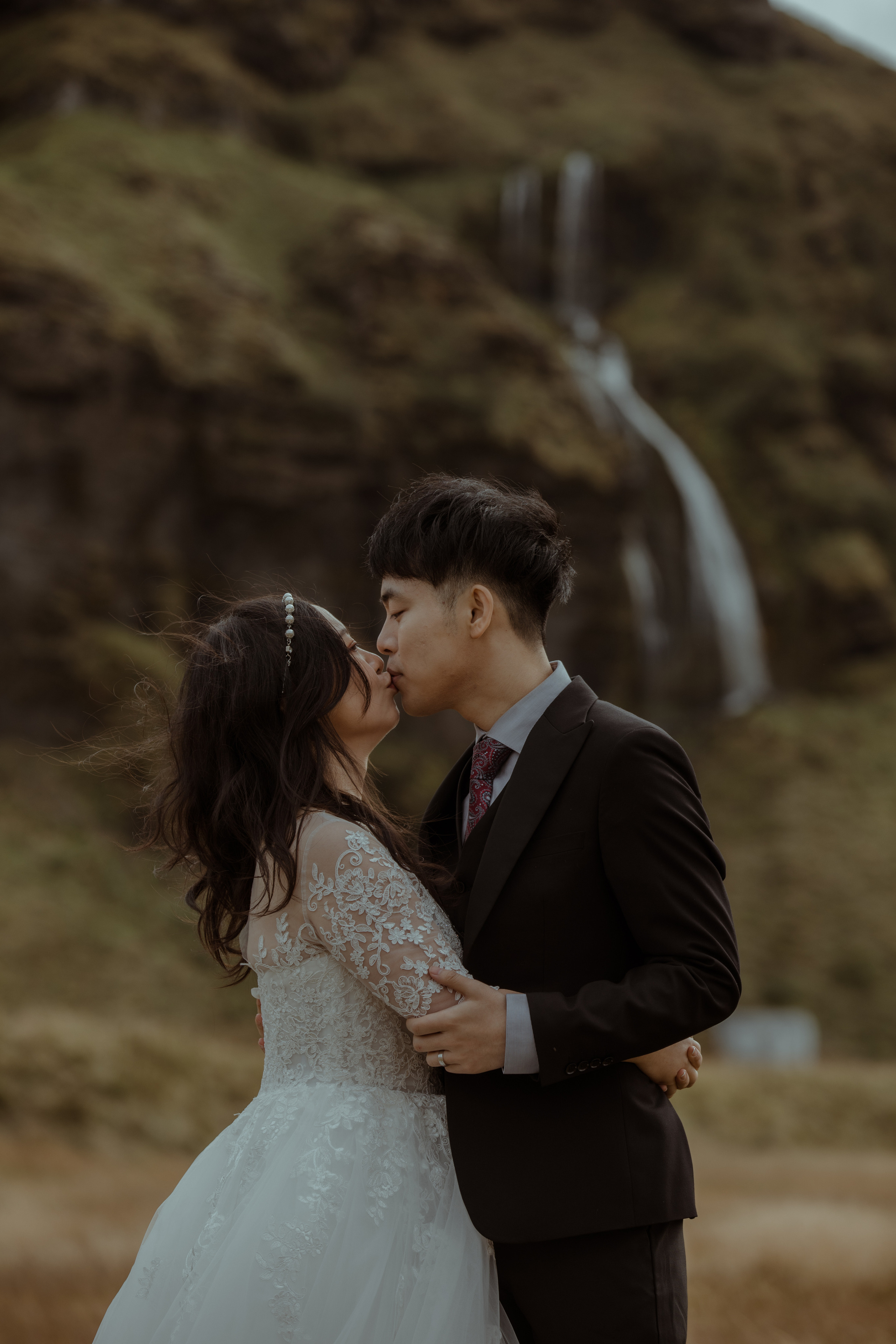 Elopement at Seljalandsfoss waterfall in Iceland. Iceland elopement photographer & videographer