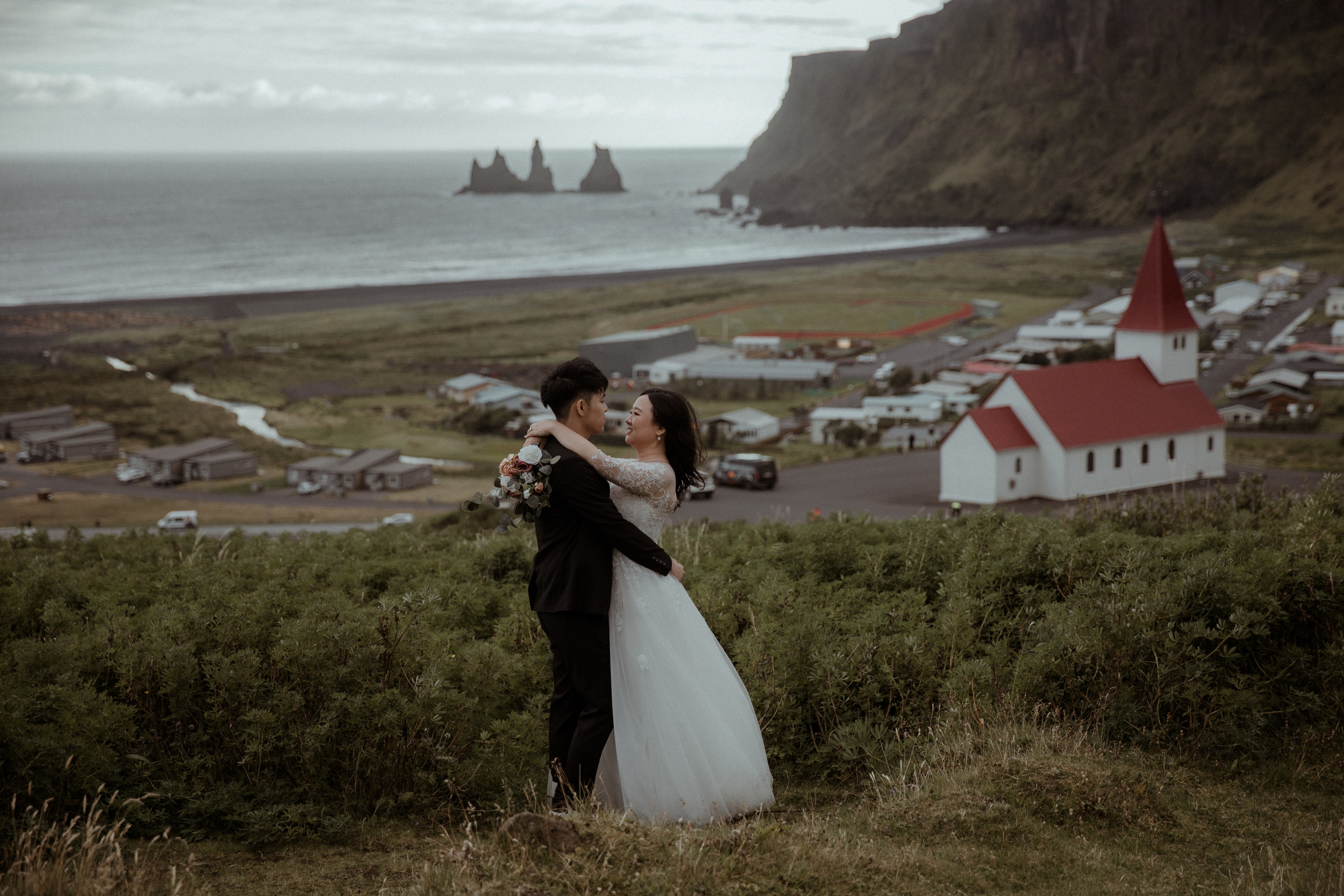 Elopement at Seljalandsfoss waterfall in Iceland. Iceland elopement photographer & videographer