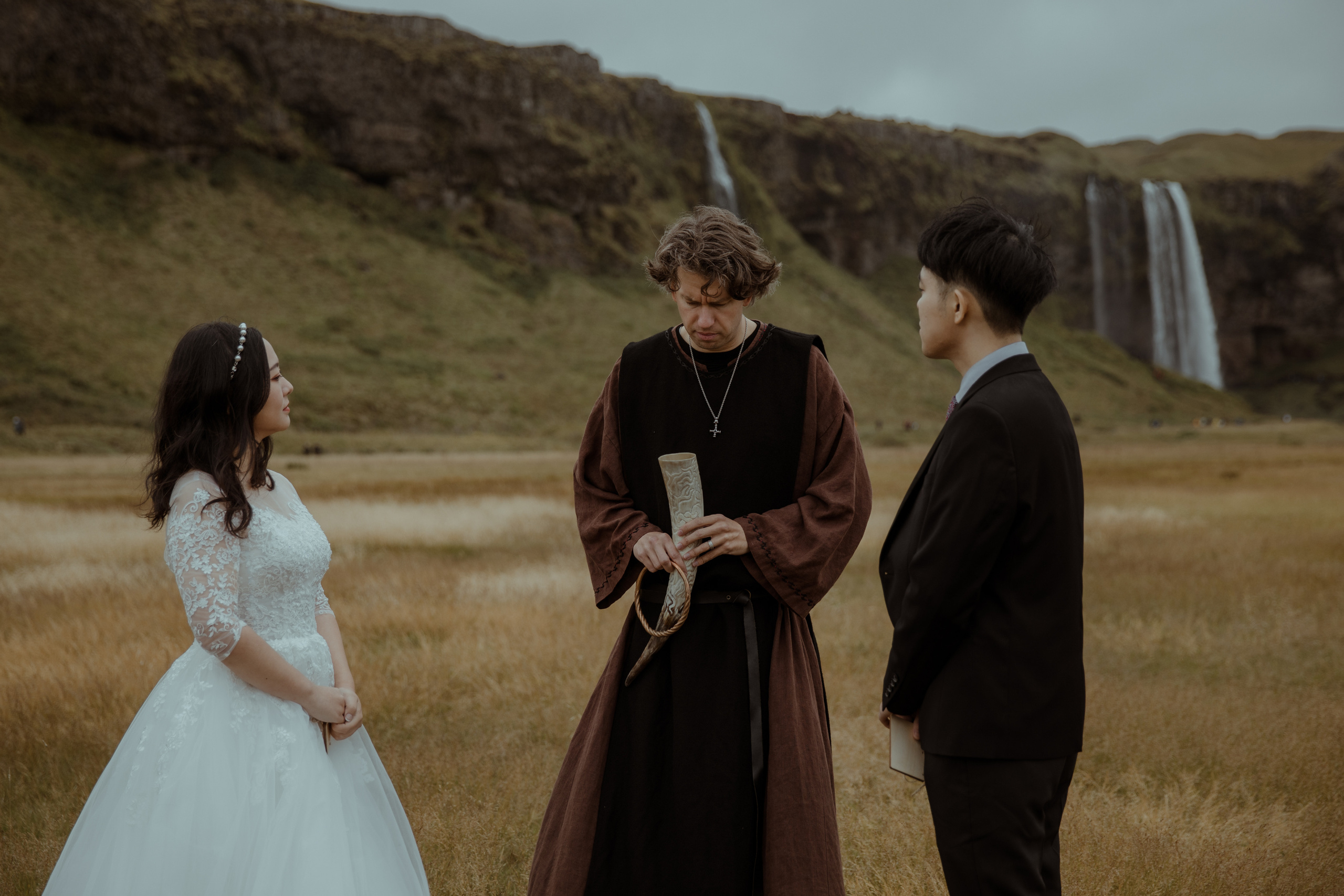 Elopement at Seljalandsfoss waterfall in Iceland. Iceland elopement photographer & videographer