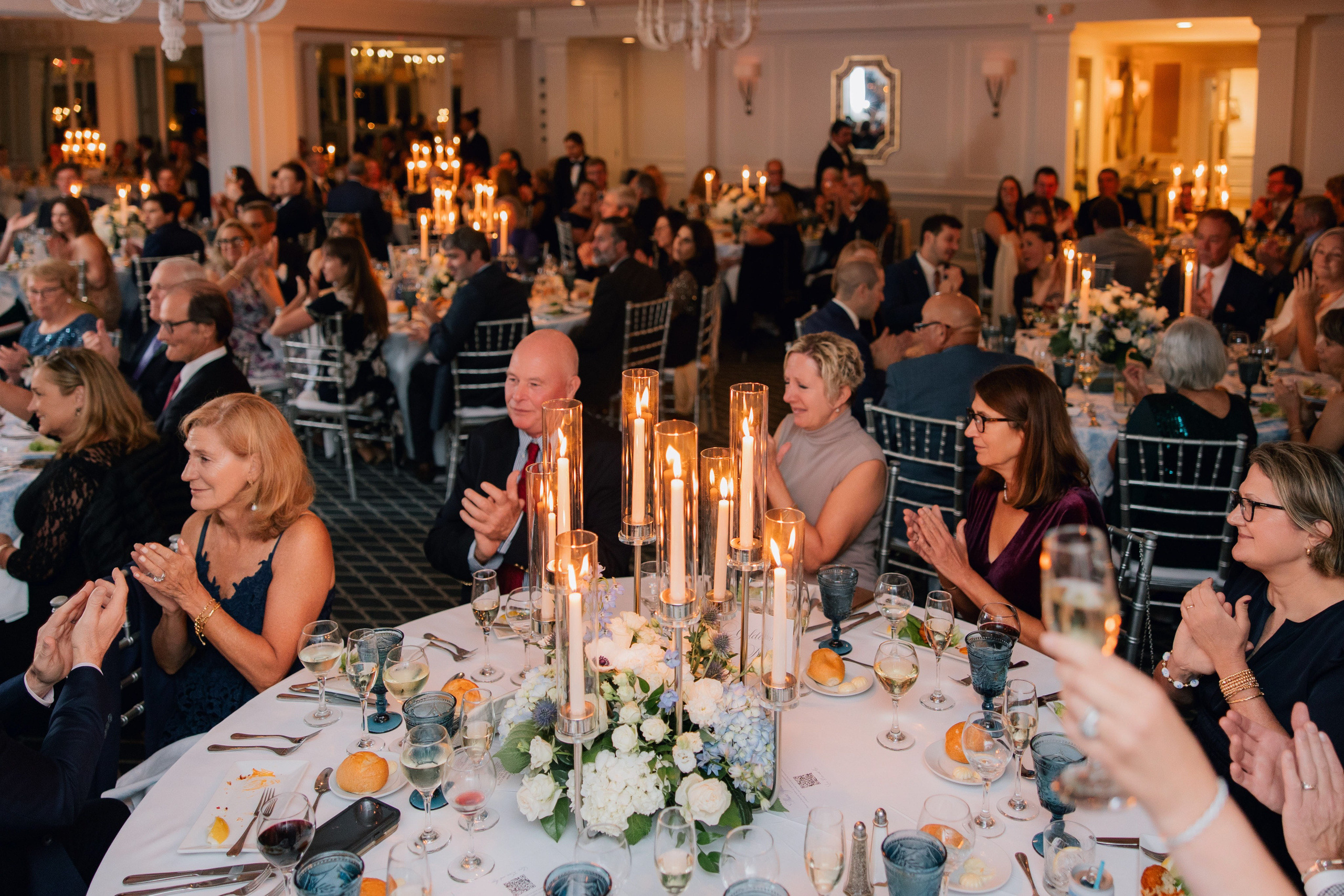 a group of people sitting around a table