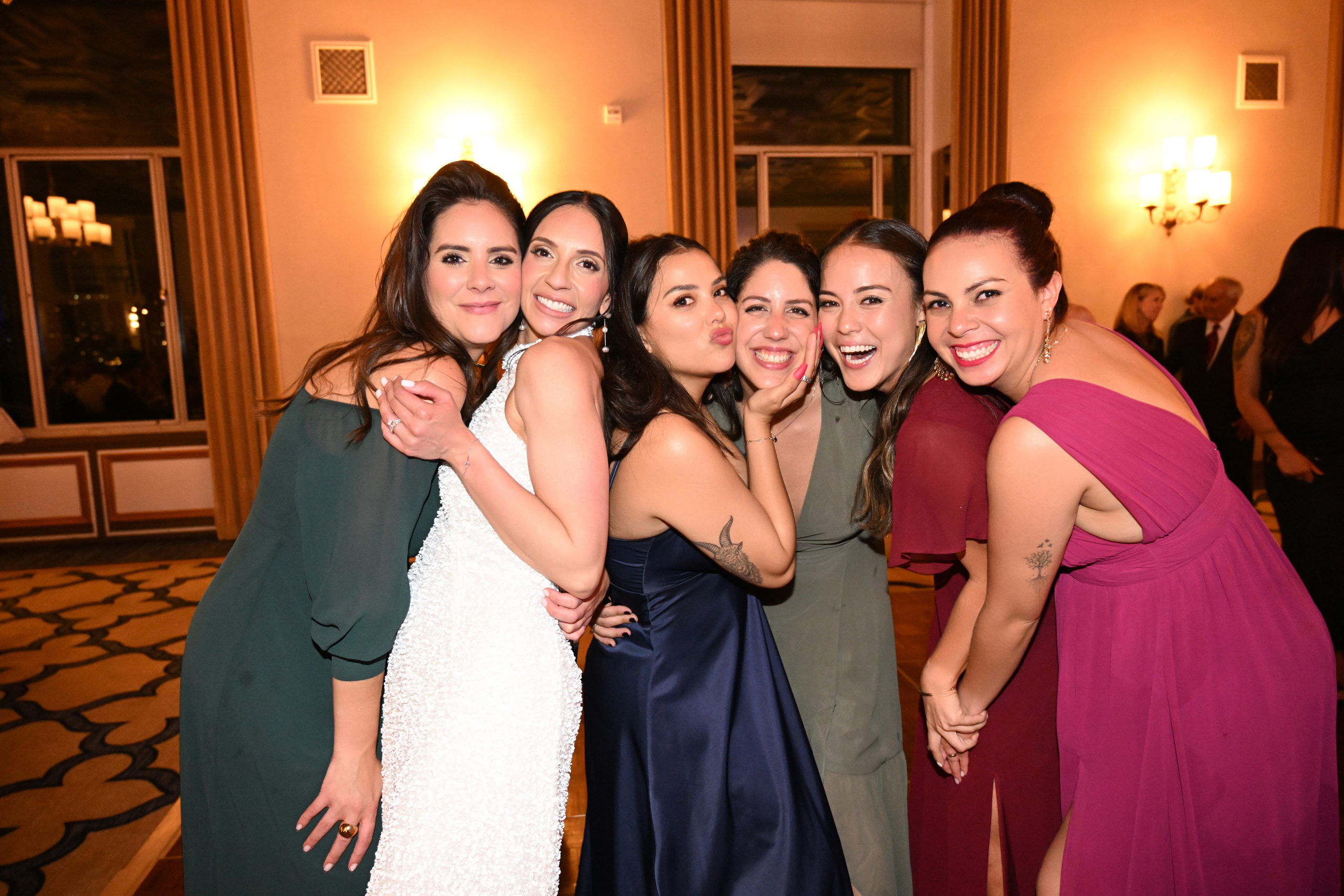 a group of women posing for a picture
