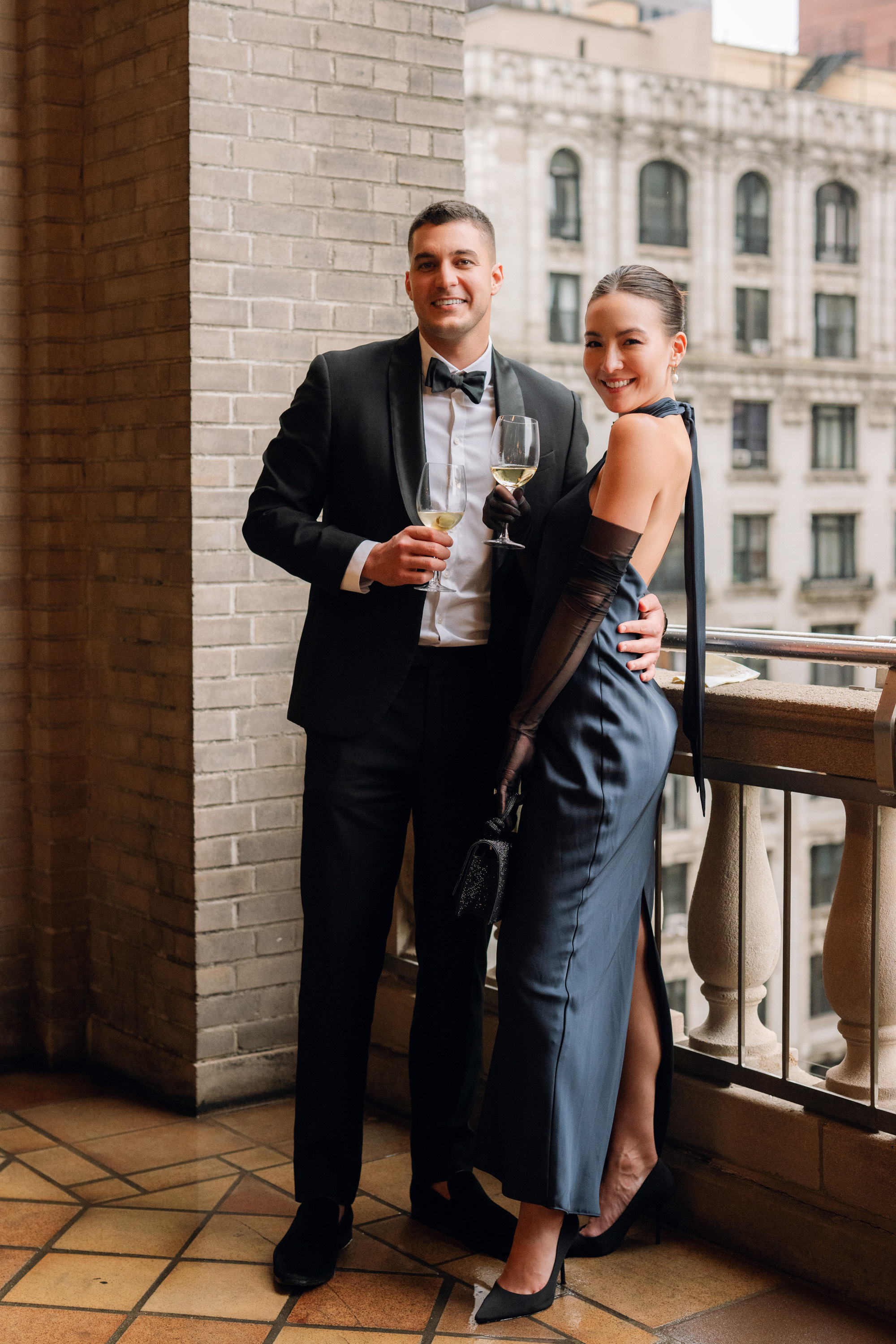 a man and woman standing next to each other people