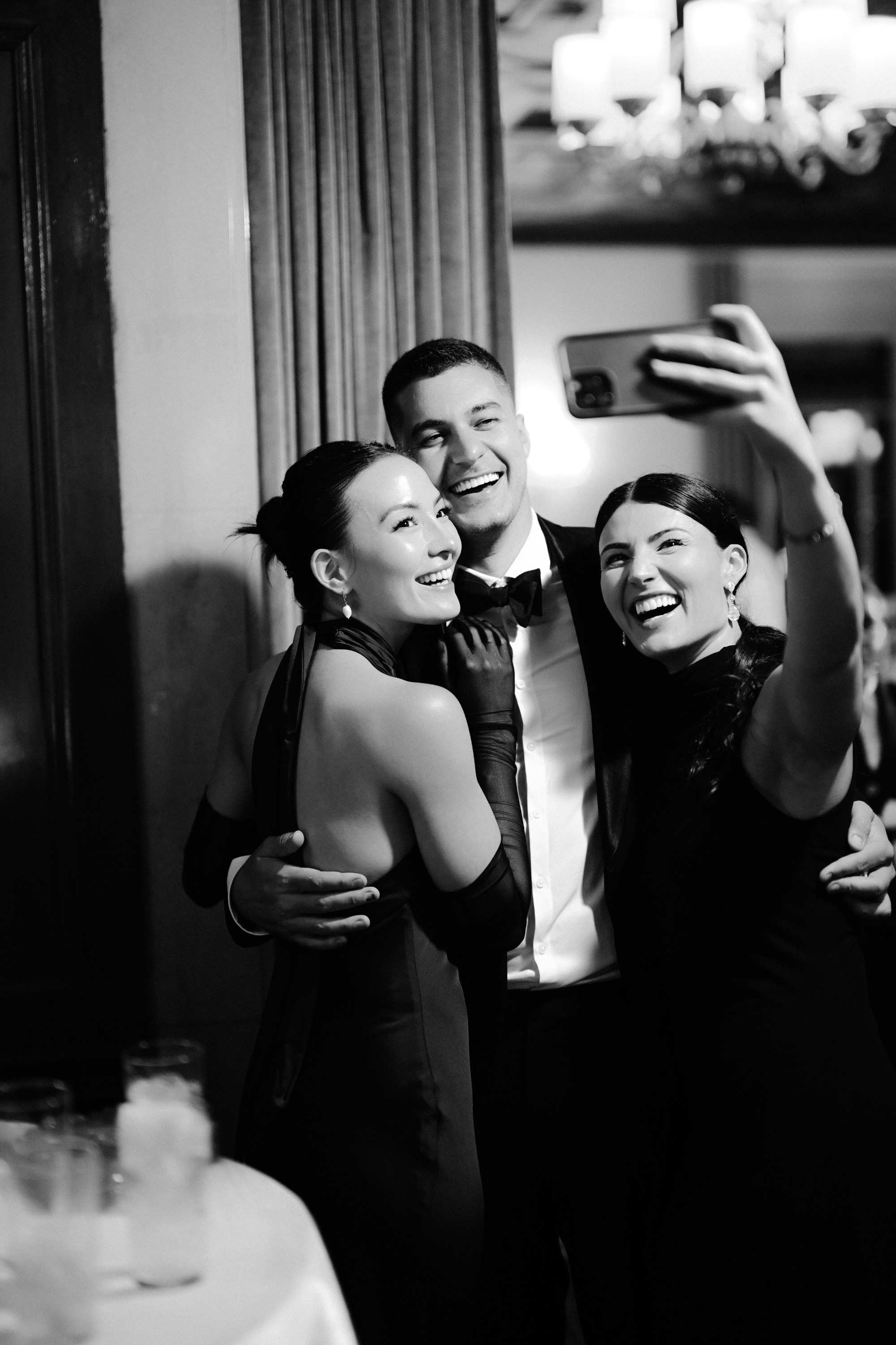 a couple taking a picture of themselvesing themselves