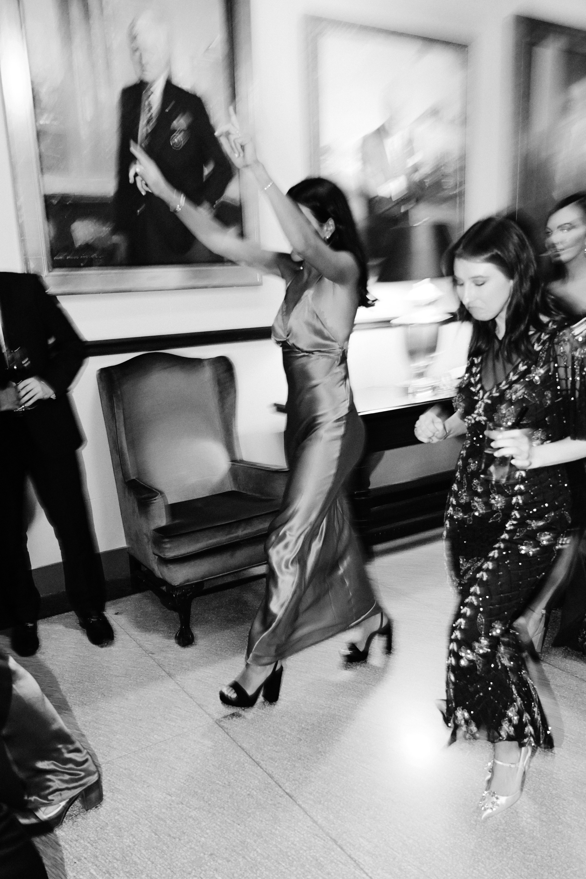 a group of people dancing in a room