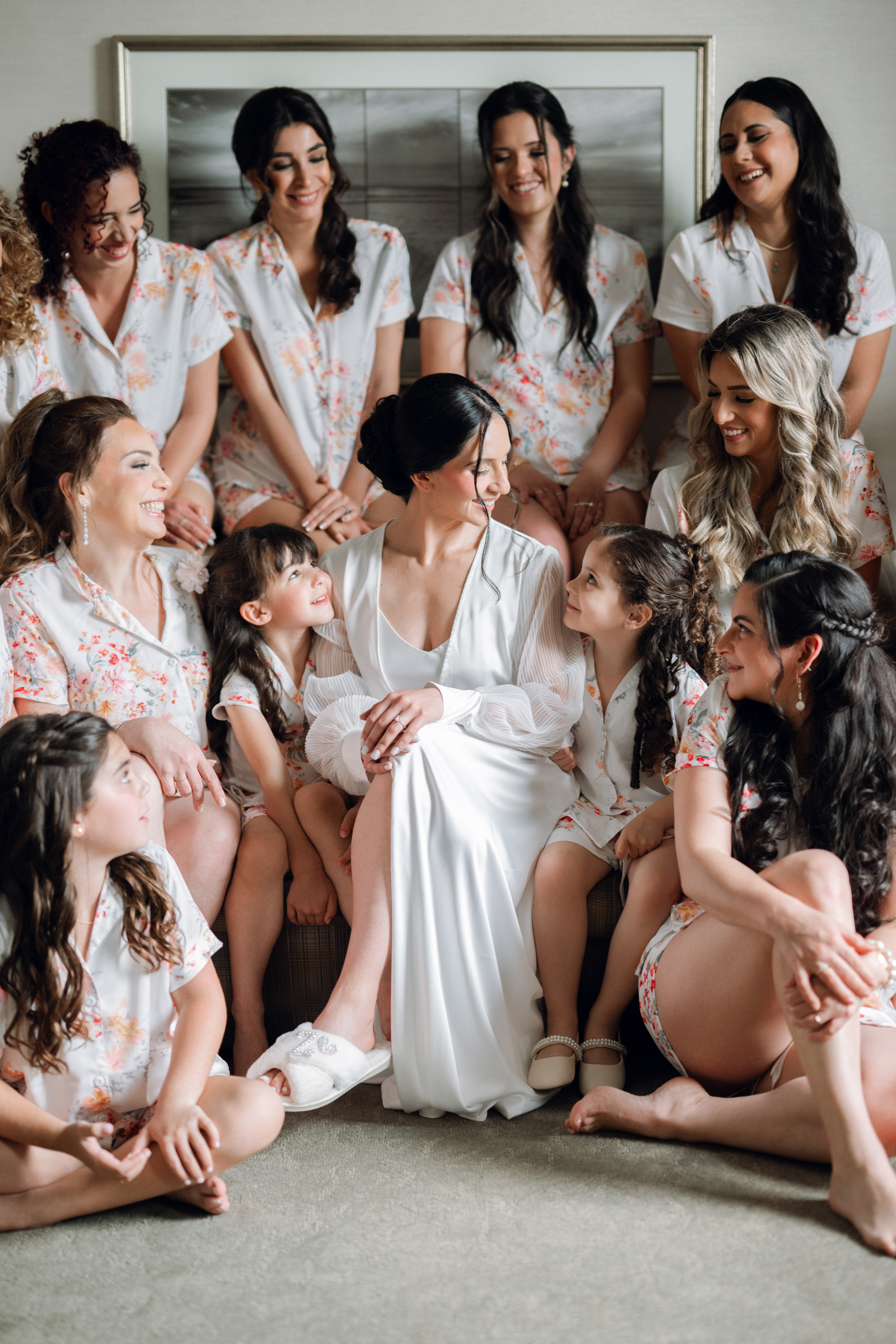a group of women sitting on the floor