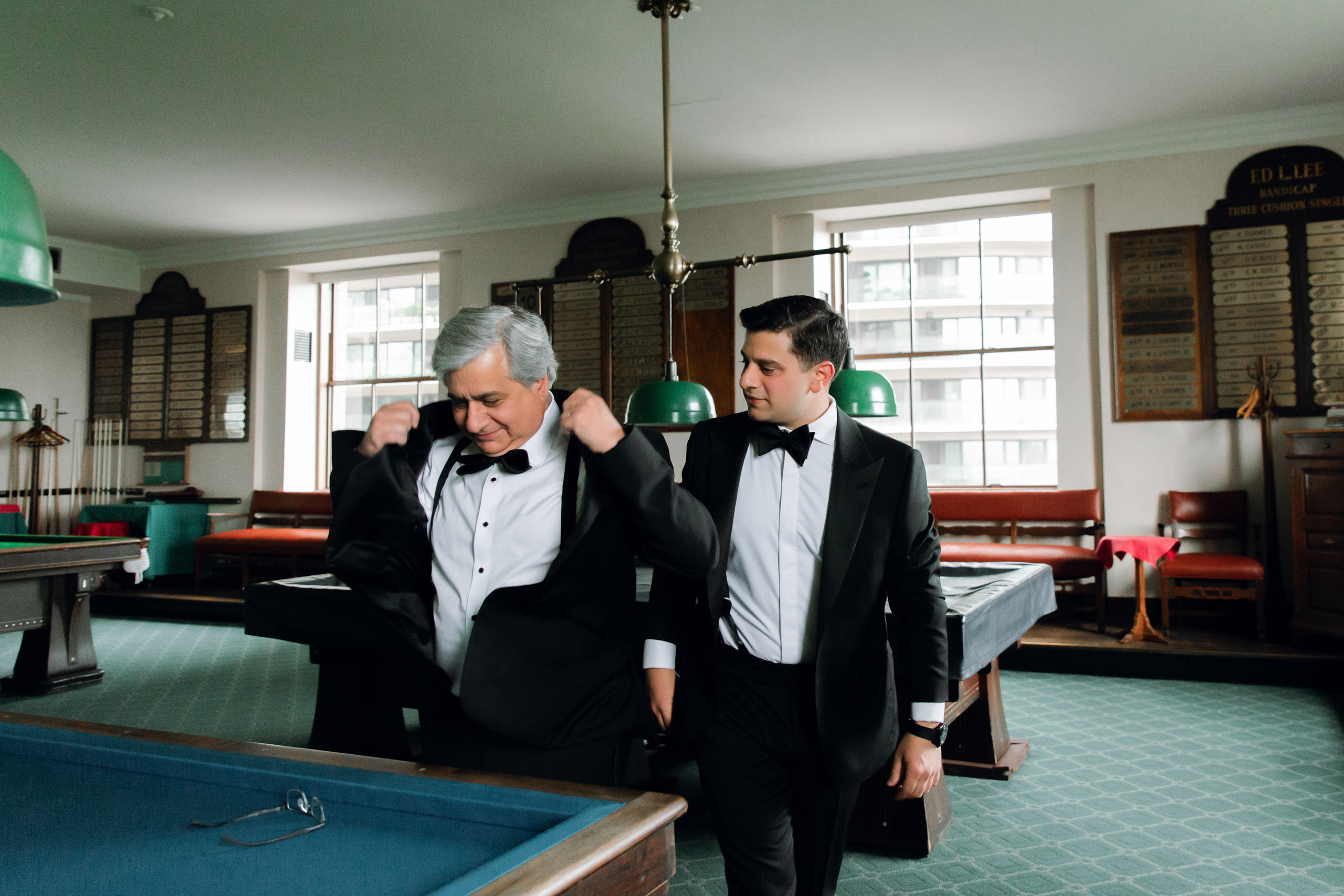 two men in tuxed suits