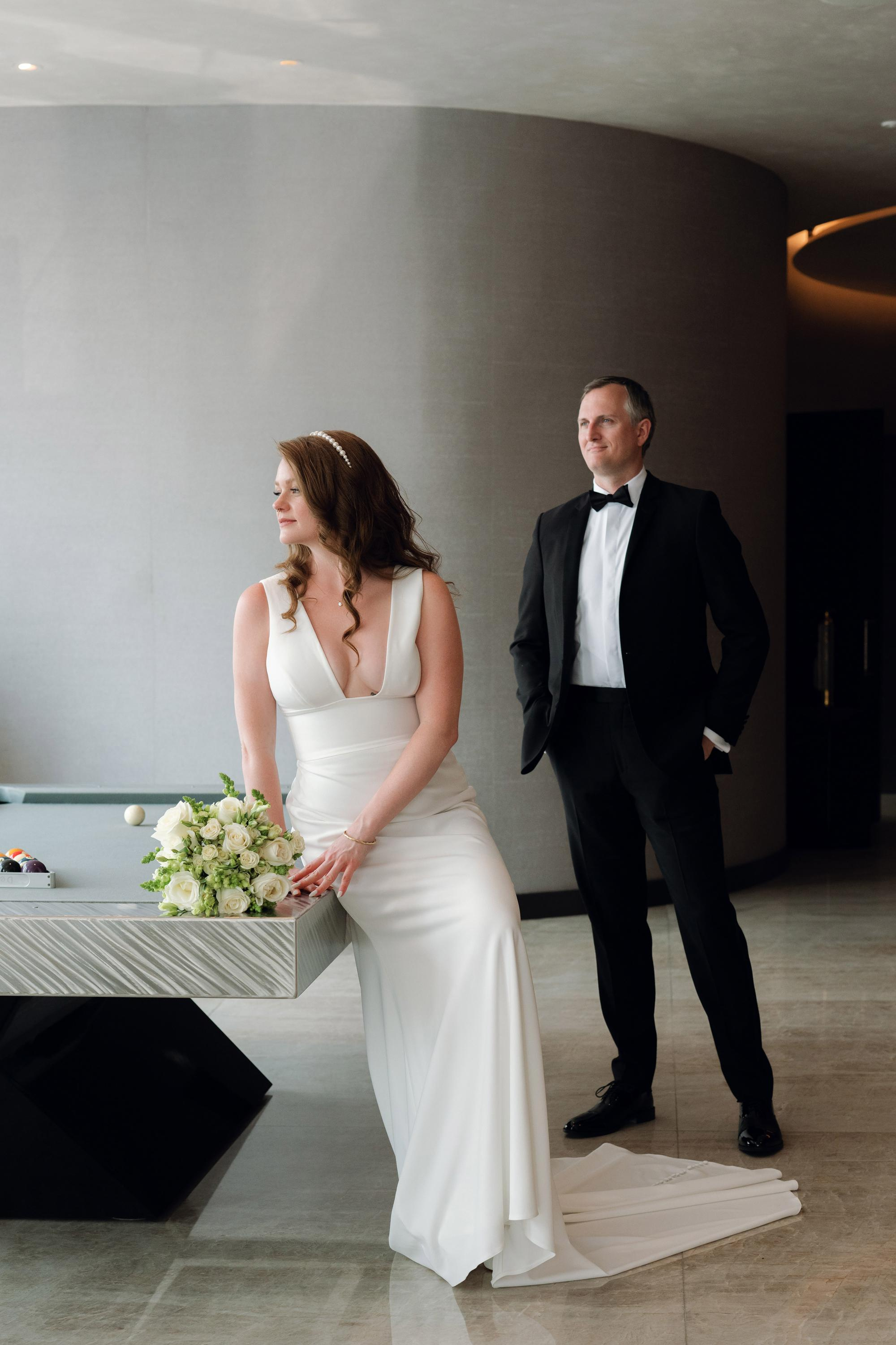 a man and woman standing in a room