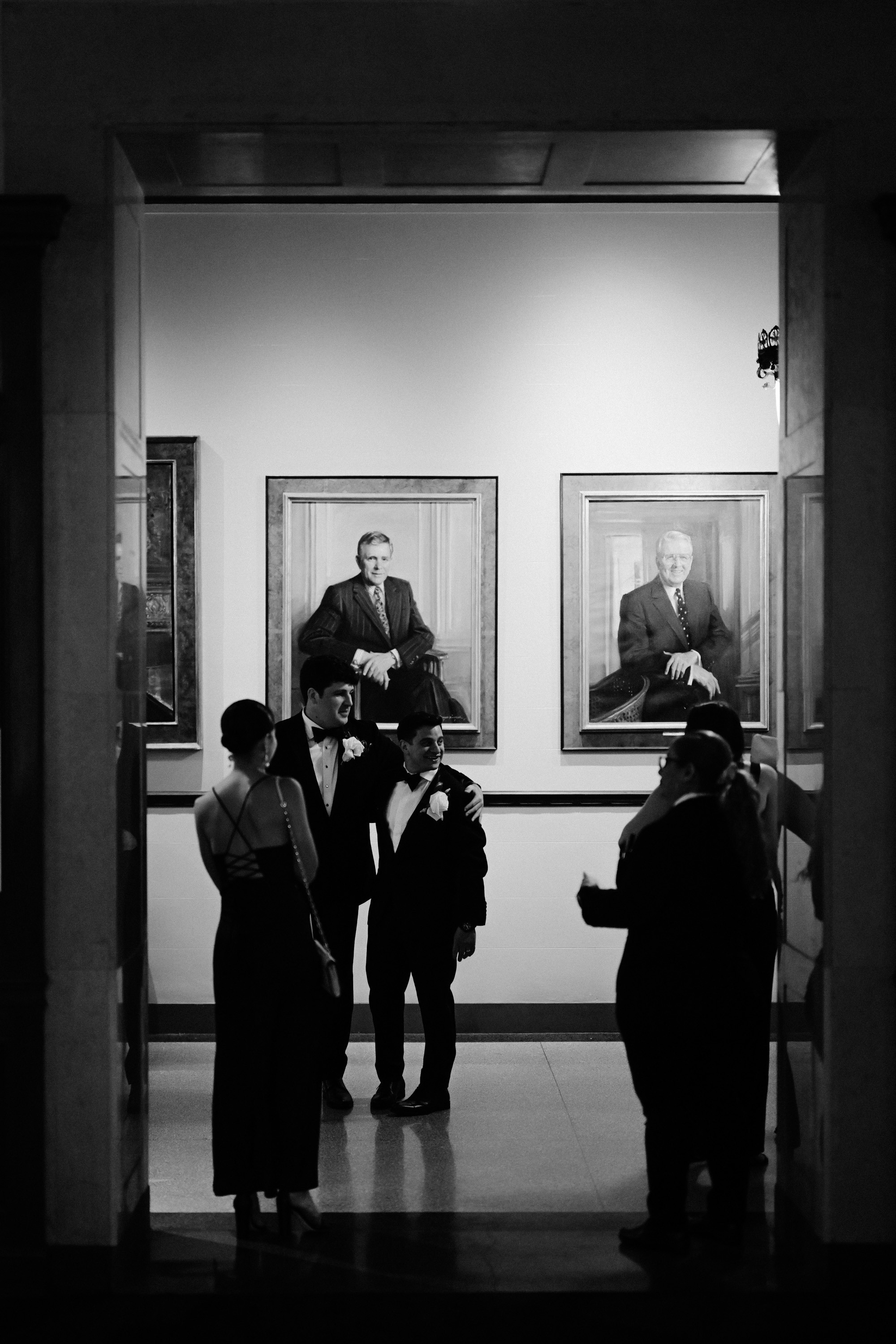 a group of people standing in a room