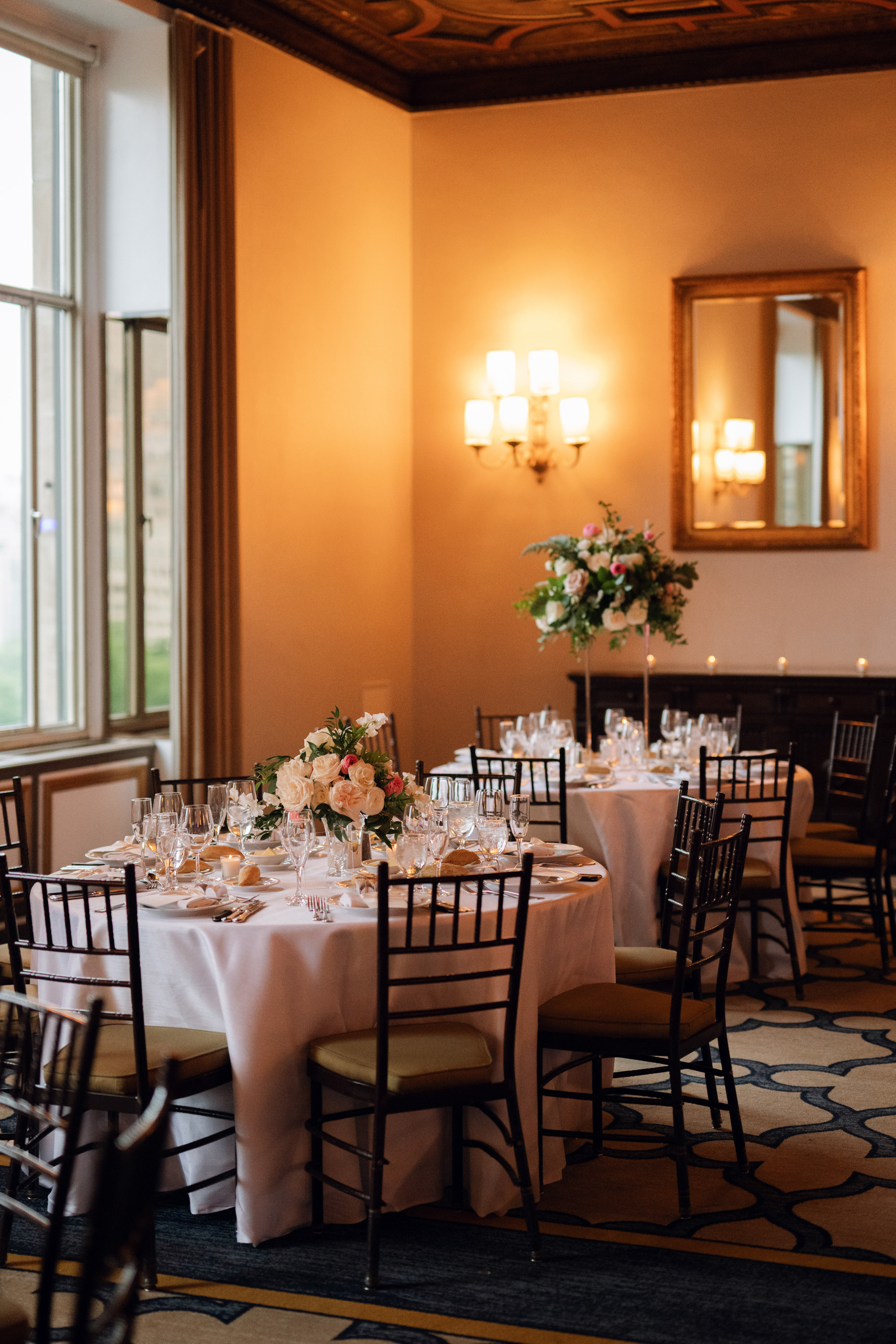 a dining room with a table and chairs