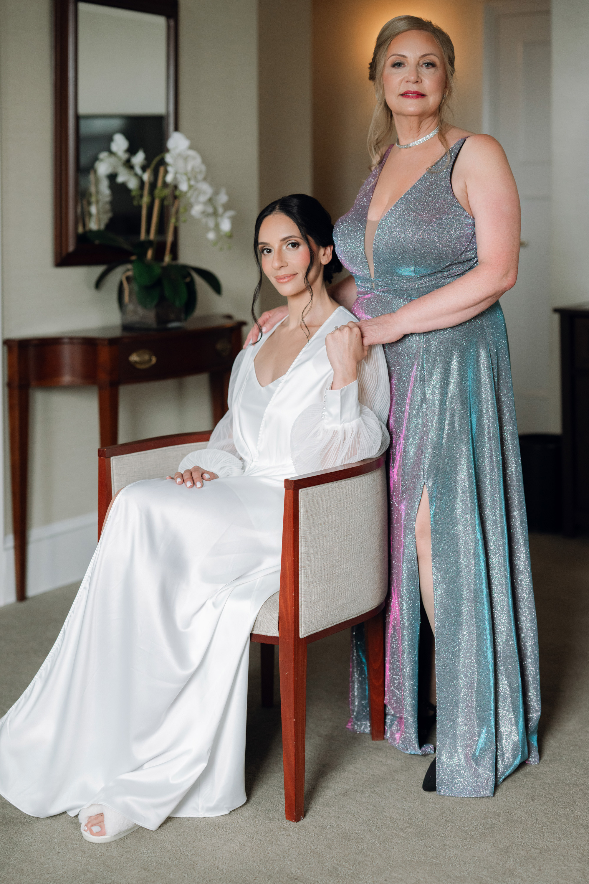 a woman in a silver dress