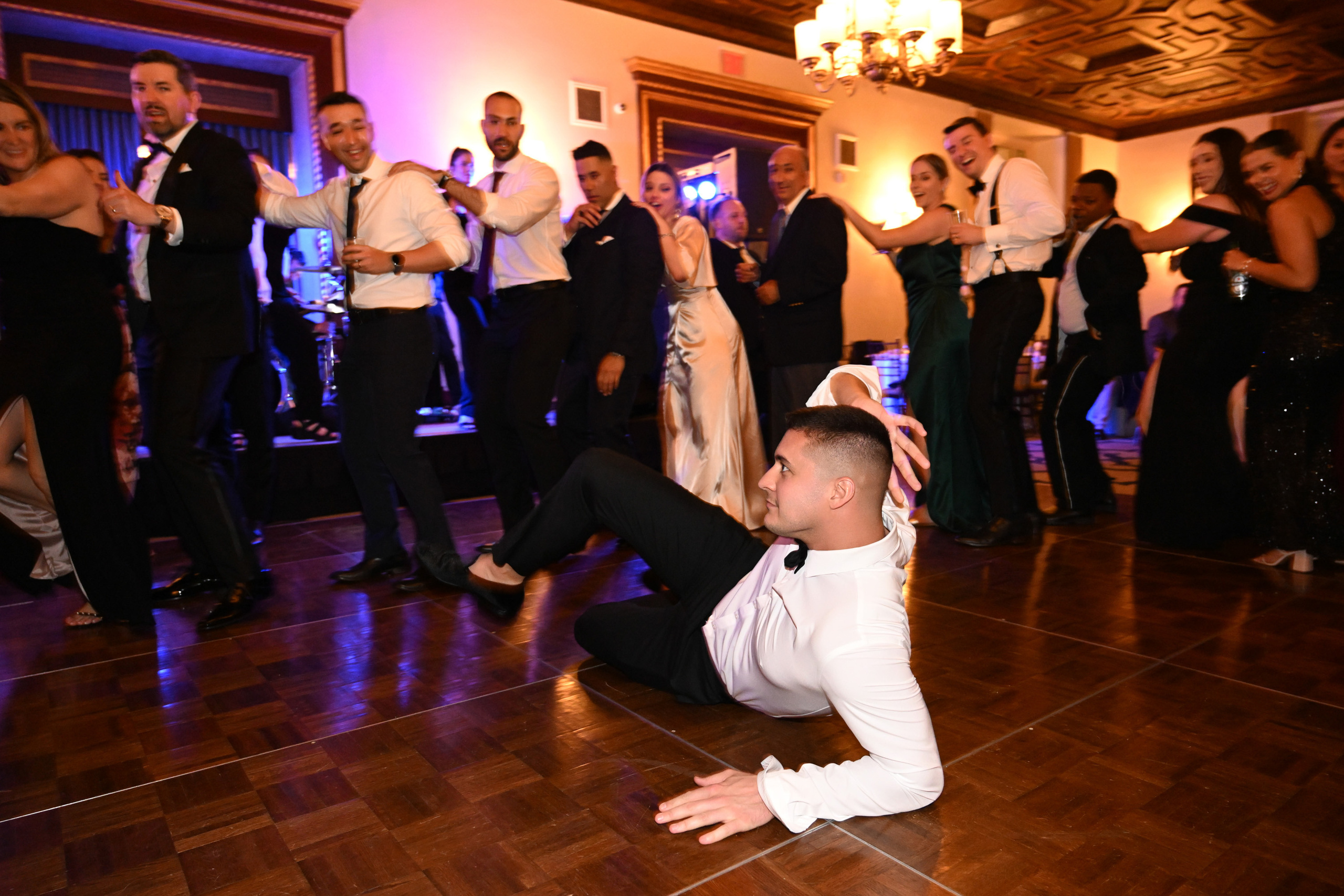 a man kneeling on the floor