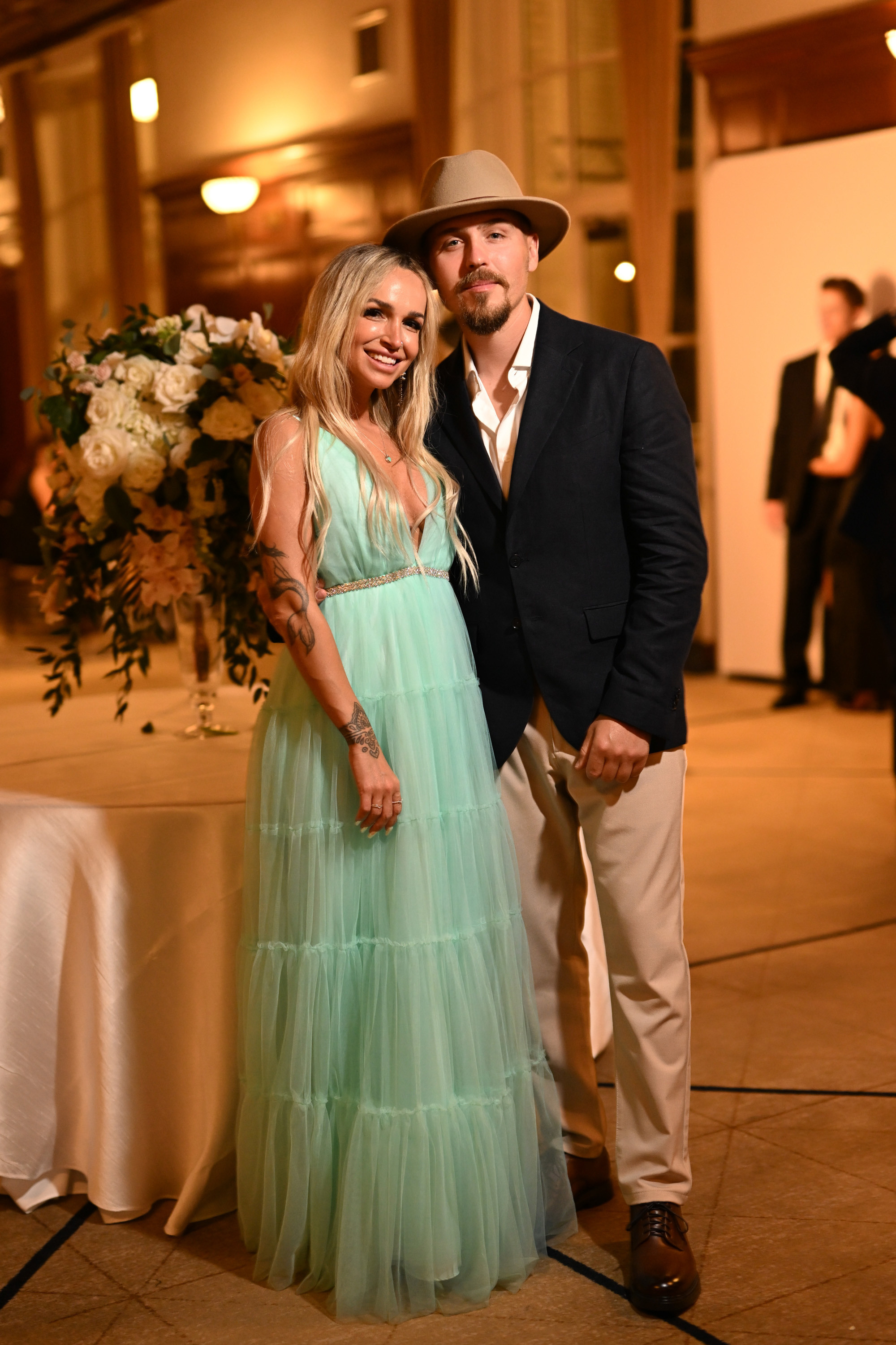 a man and woman posing for a picture