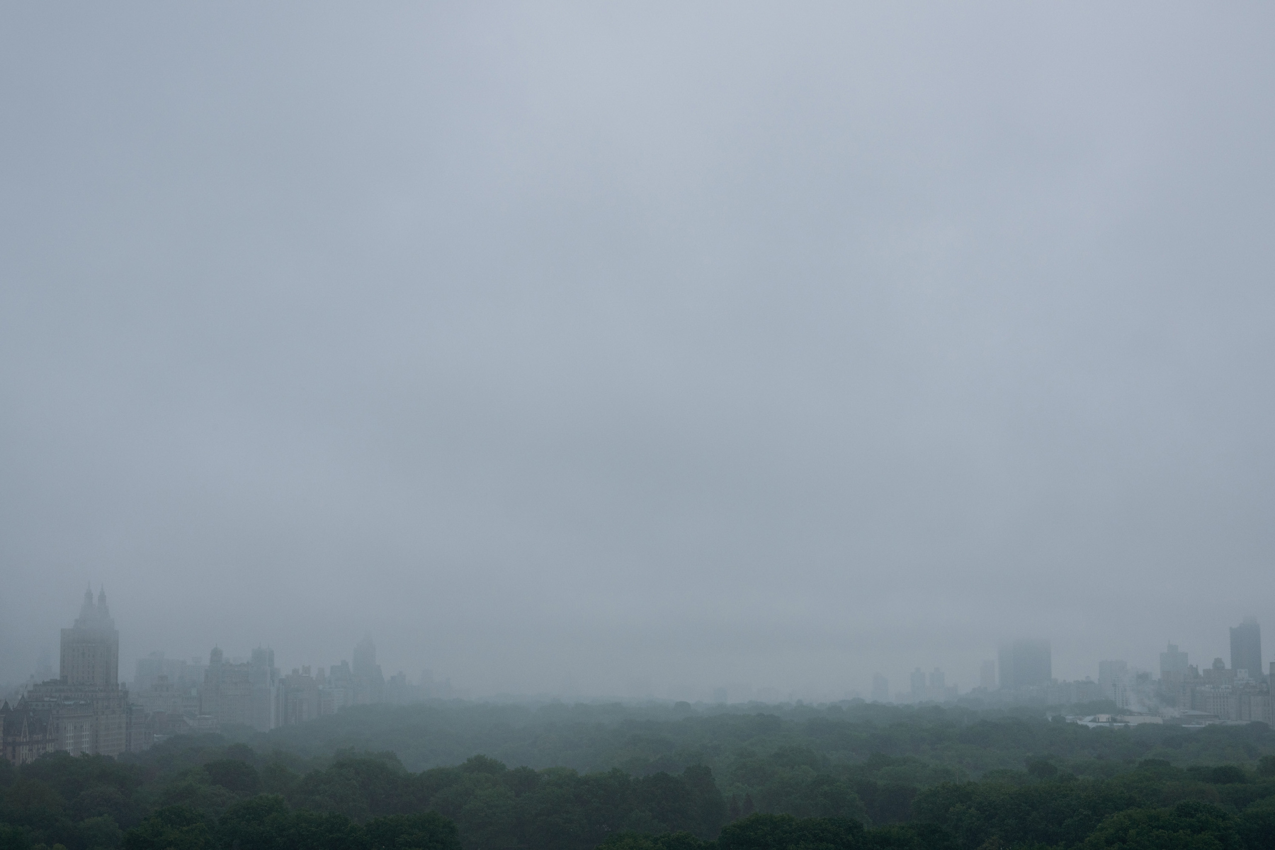 a large city skyline with a few buildings
